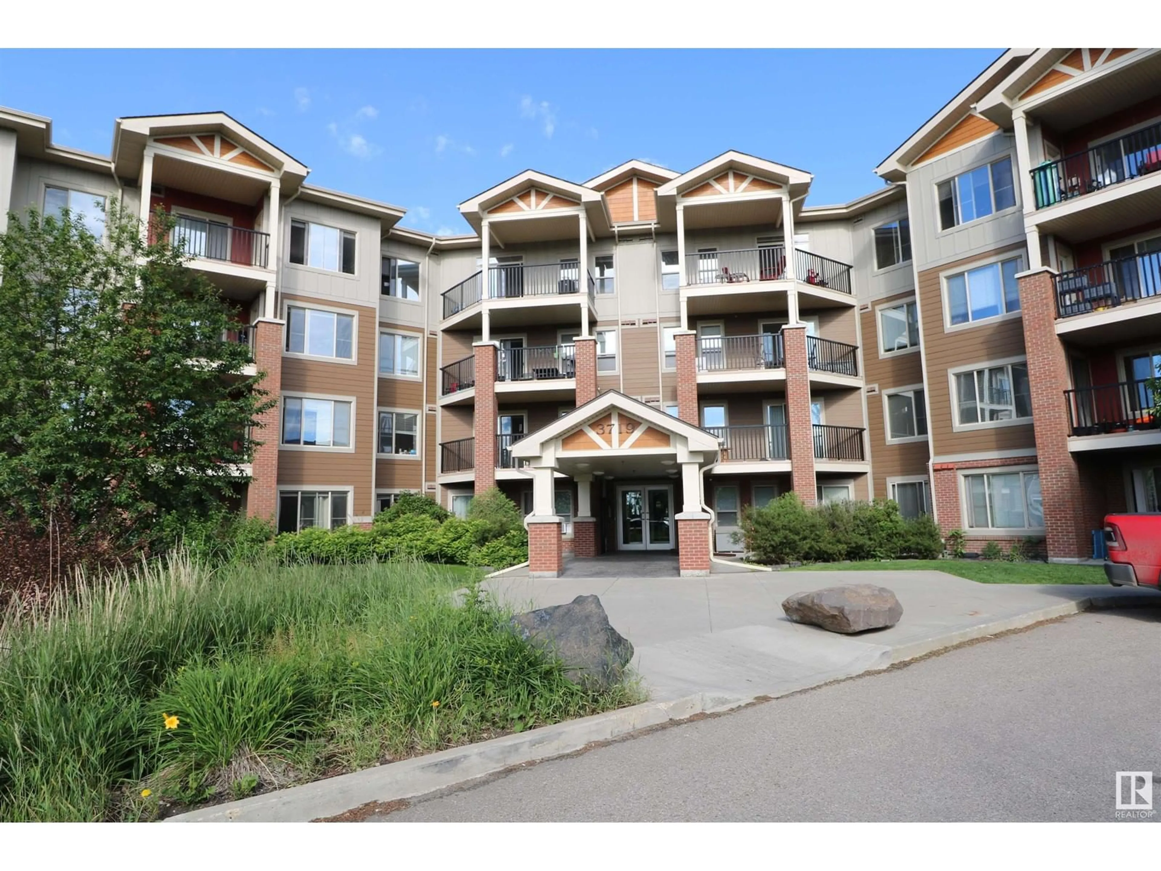 A pic from exterior of the house or condo, the front or back of building for #210 3719 WHITELAW LN NW, Edmonton Alberta T6W2C3