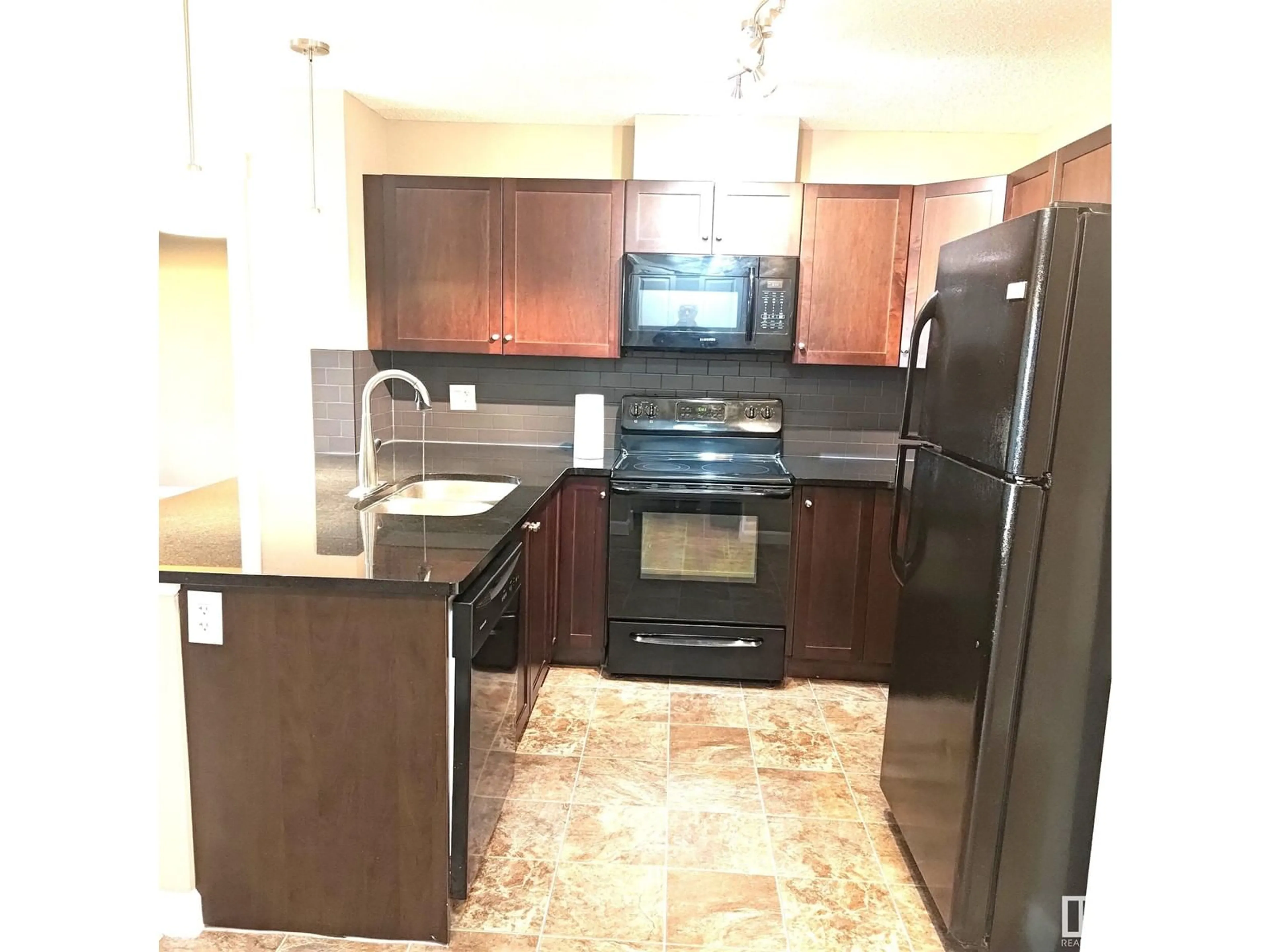 Standard kitchen, ceramic floors for #210 3719 WHITELAW LN NW, Edmonton Alberta T6W2C3