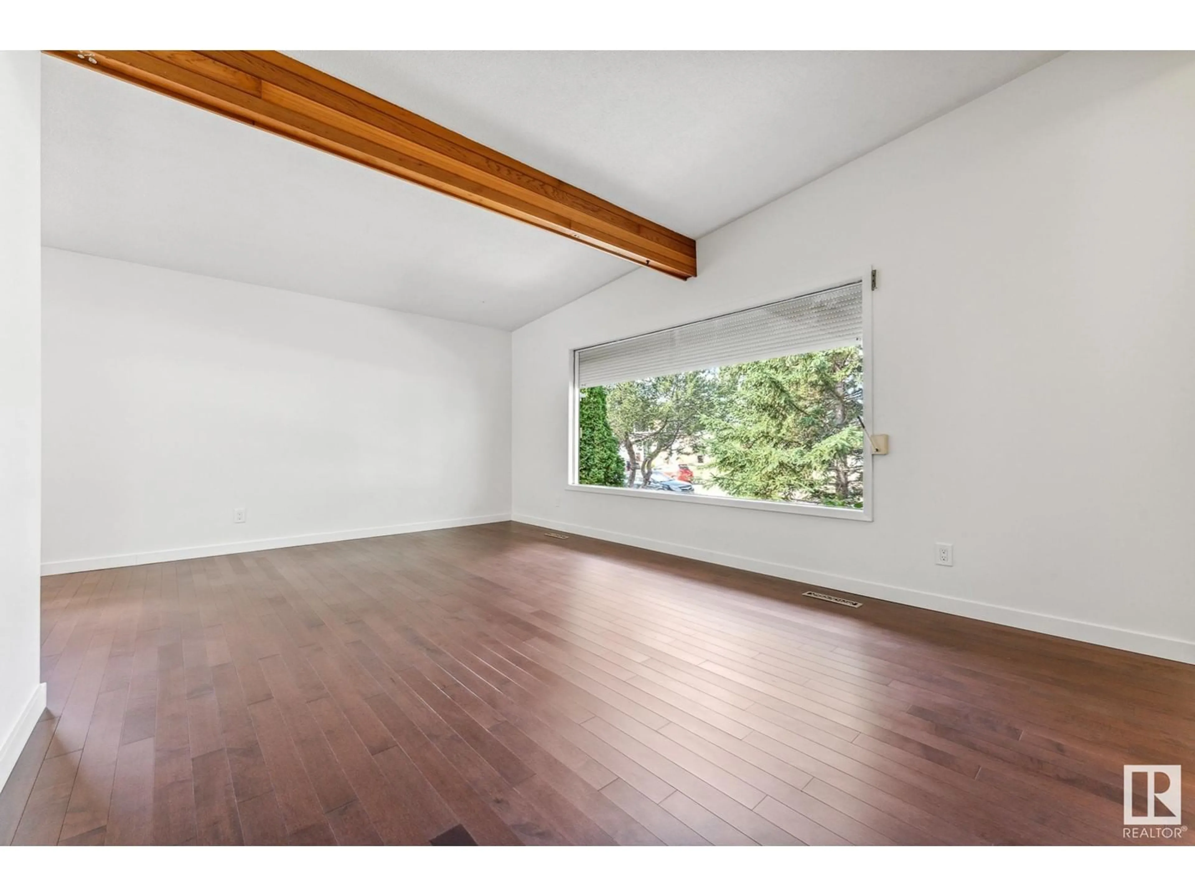 A pic of a room, wood floors for 4415 117 Street NW, Edmonton Alberta T6J1T5