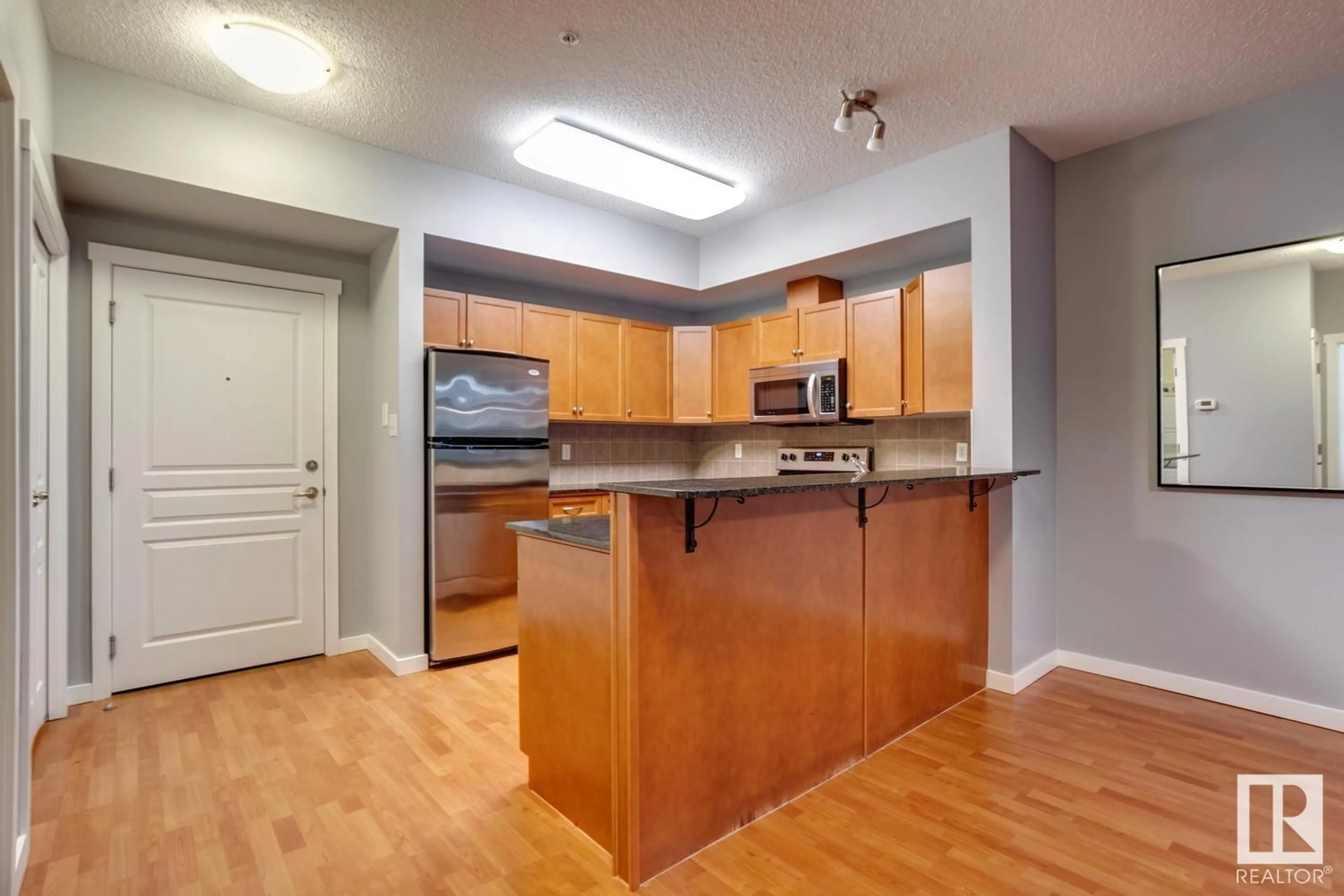 Standard kitchen, wood floors for #105 11140 68 AV NW, Edmonton Alberta T6H0L4