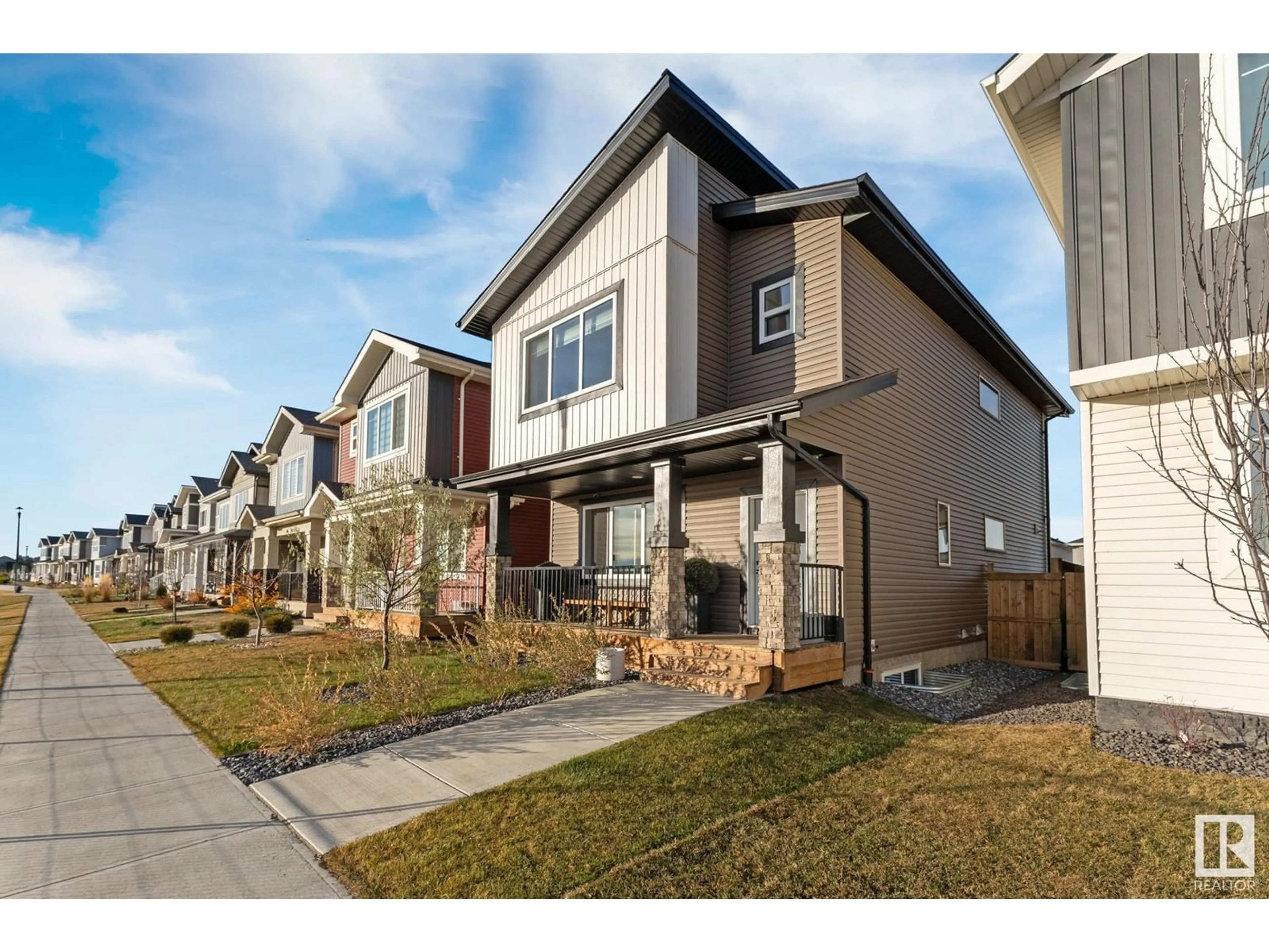 Frontside or backside of a home, the fenced backyard for 20513 99B AV NW, Edmonton Alberta T5T7N3