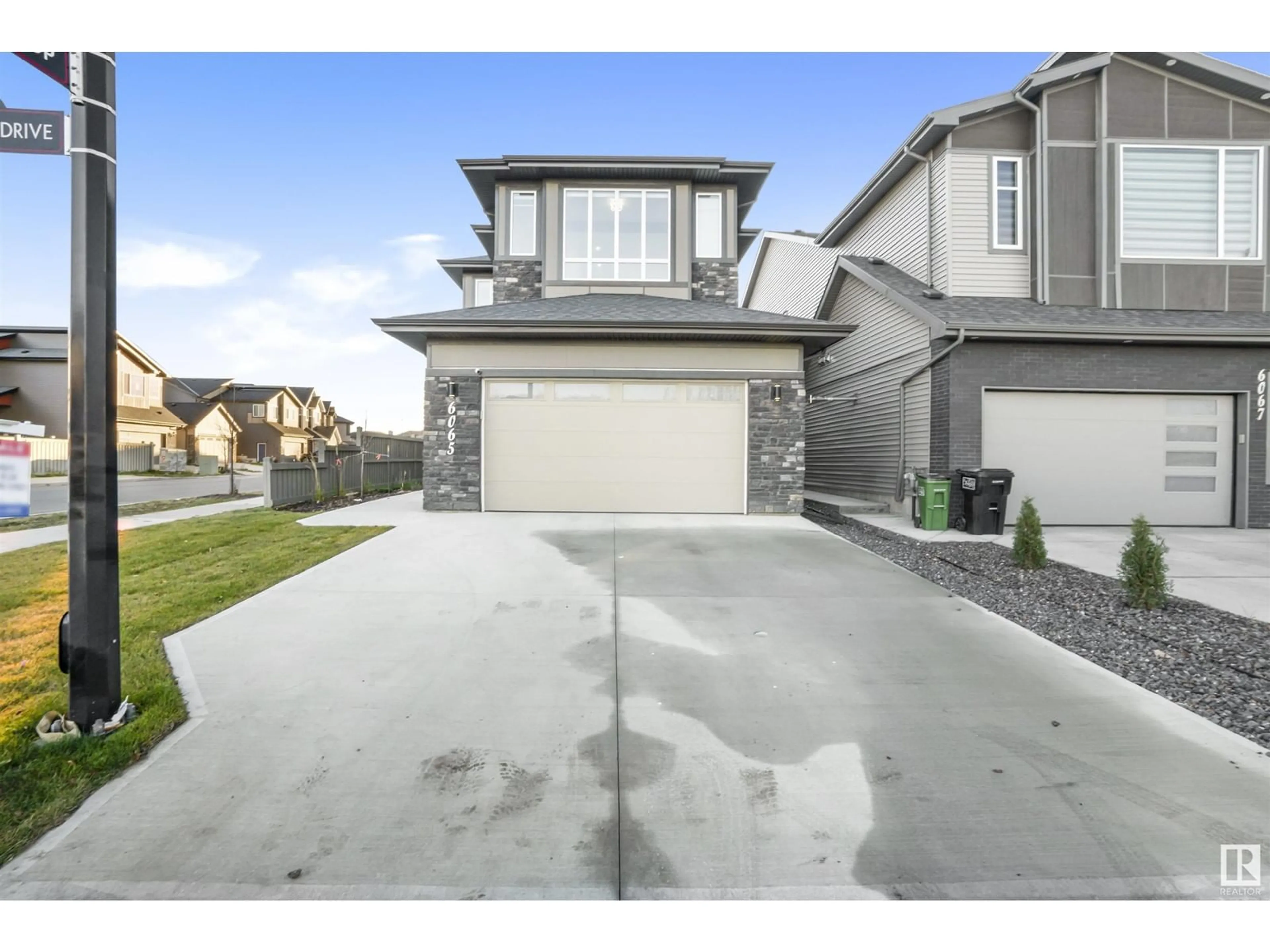 Frontside or backside of a home, the street view for 6065 crawford dr SW, Edmonton Alberta T6W4L6