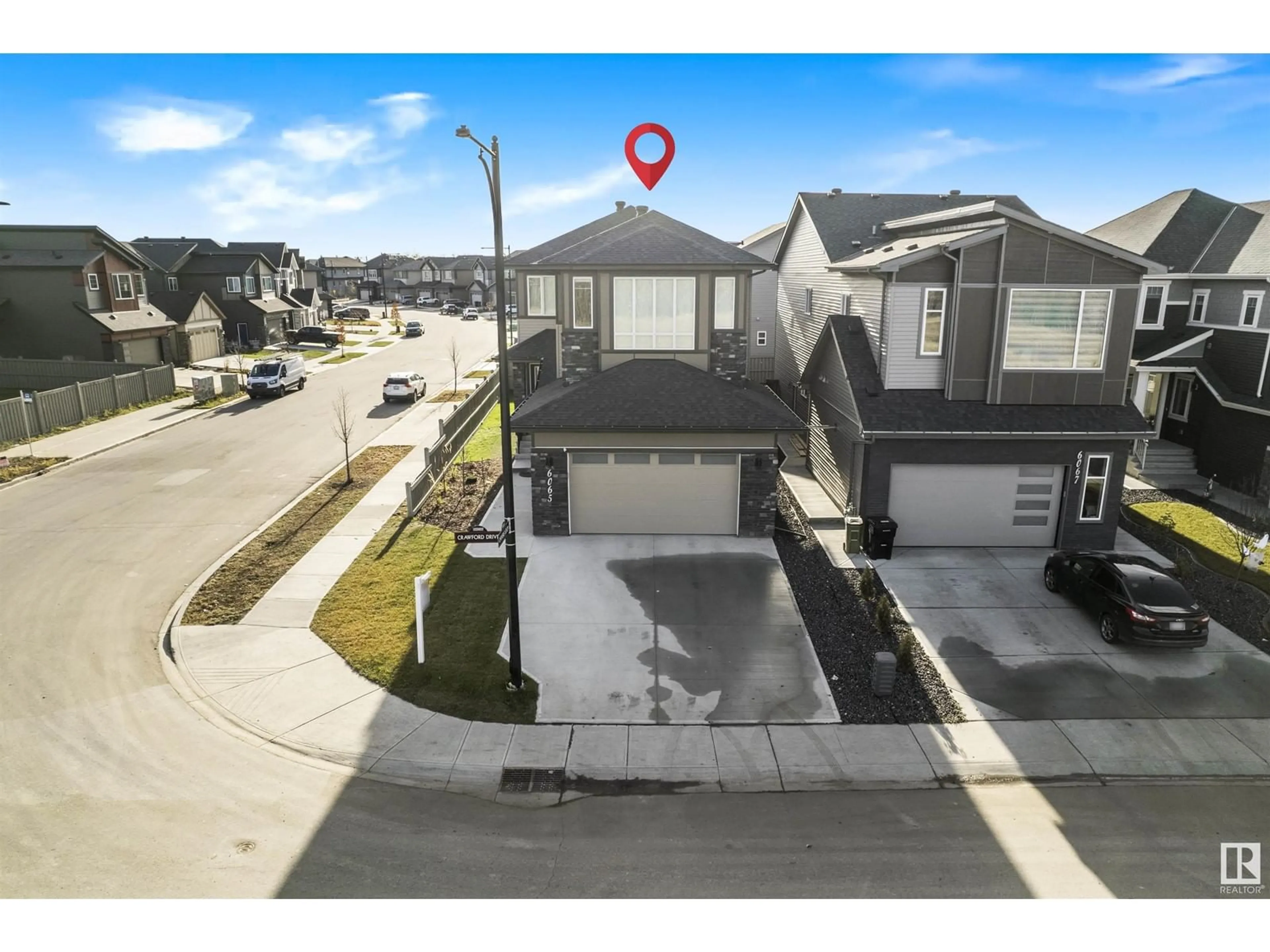 A pic from exterior of the house or condo, the street view for 6065 crawford dr SW, Edmonton Alberta T6W4L6