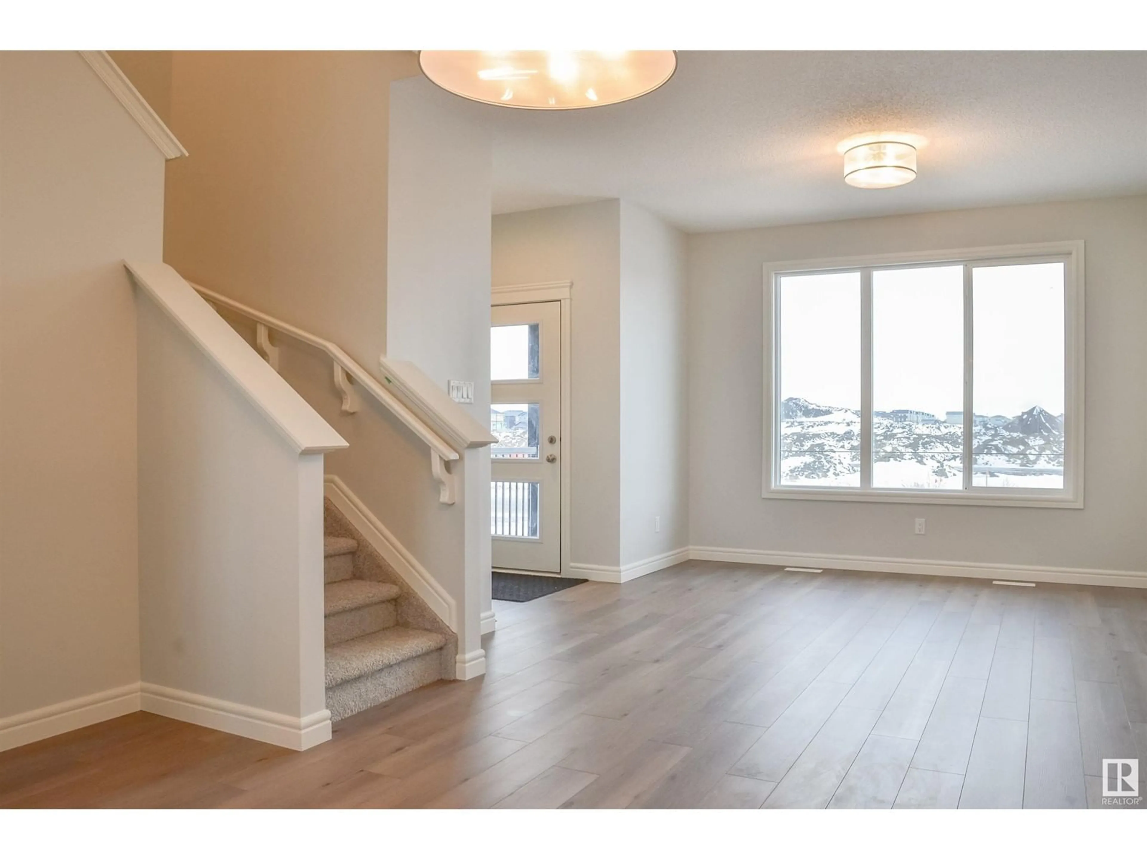 Indoor entryway, wood floors for 18927 29 AV NW, Edmonton Alberta T6M3C4