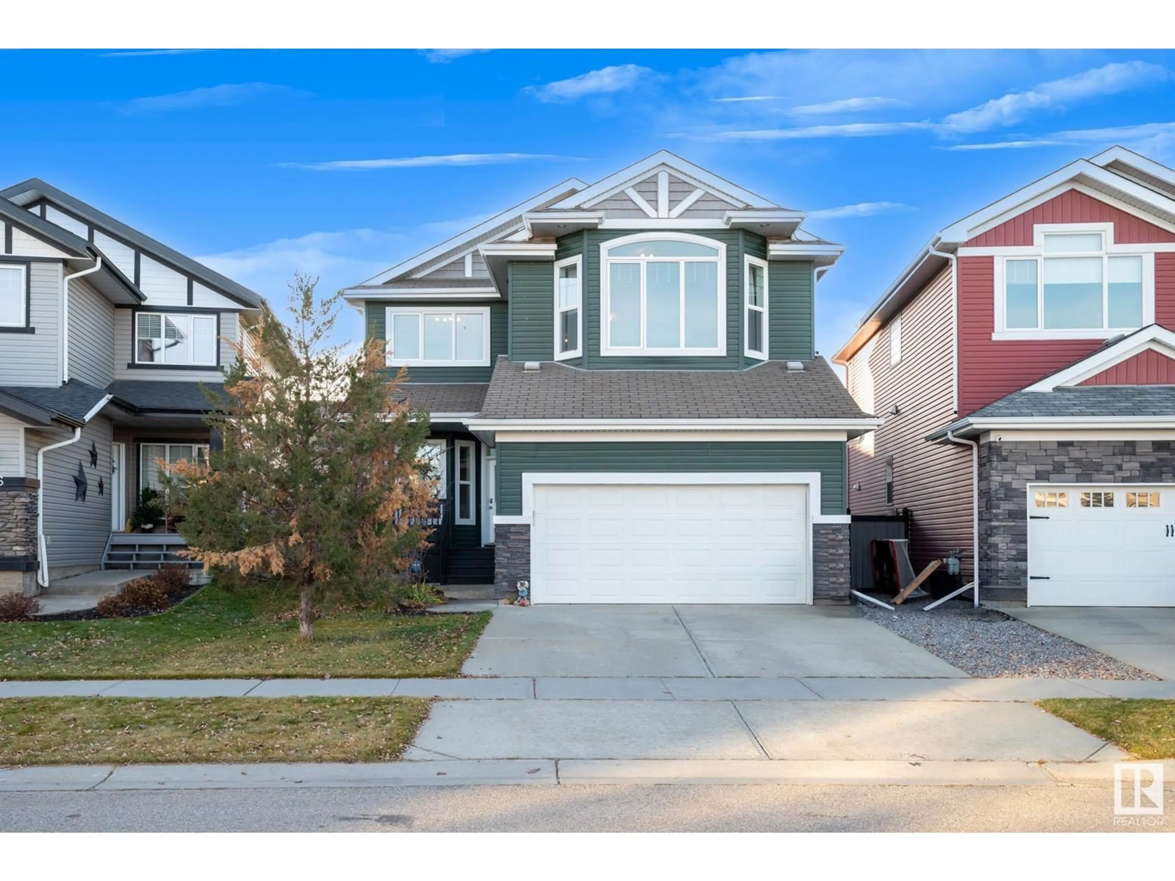 Frontside or backside of a home, the street view for 124 KEYPORT CI, Leduc Alberta T9E0J3