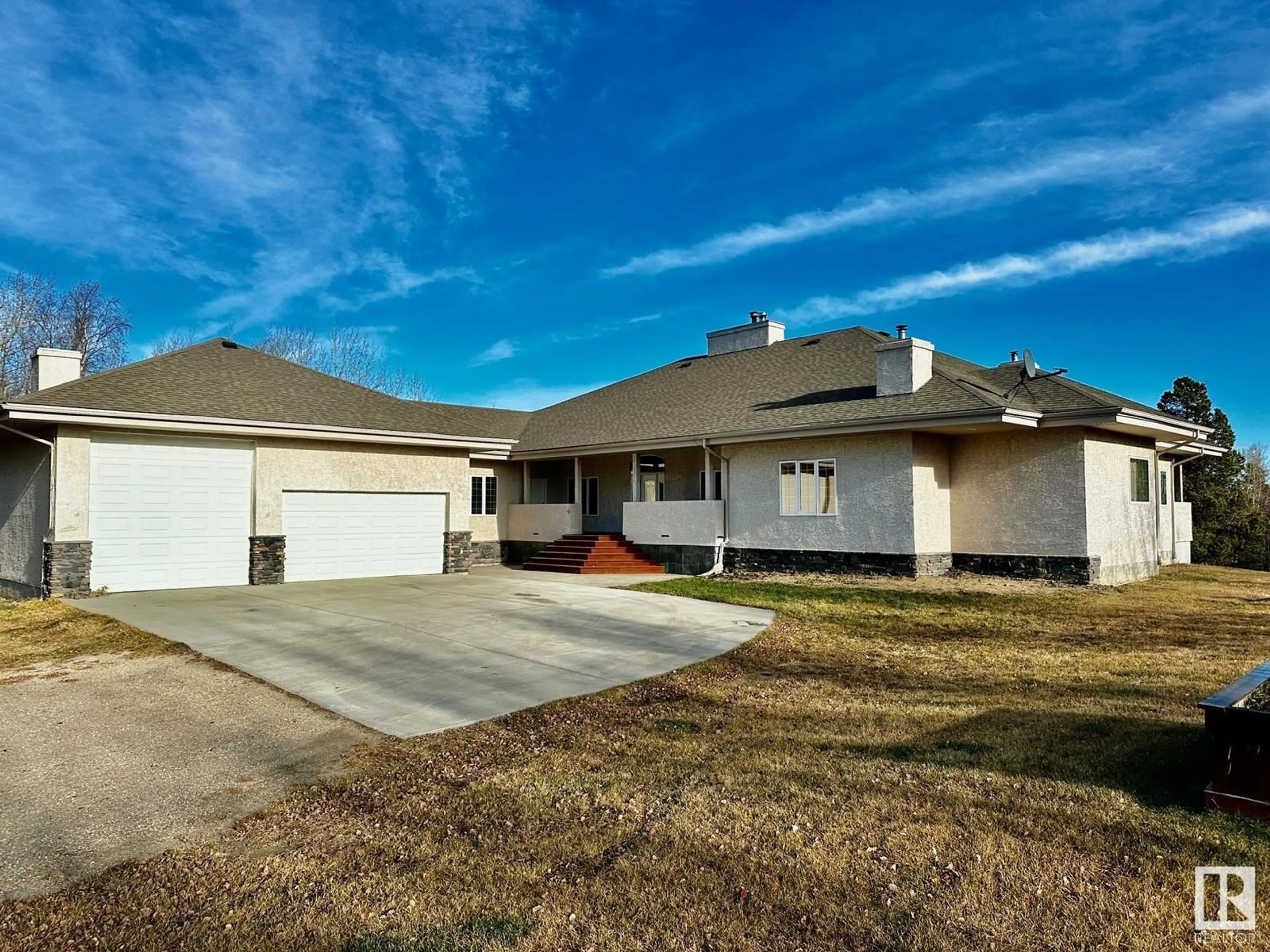 Frontside or backside of a home, the front or back of building for #19 54129 RGE ROAD 275, Rural Parkland County Alberta T7X3S4