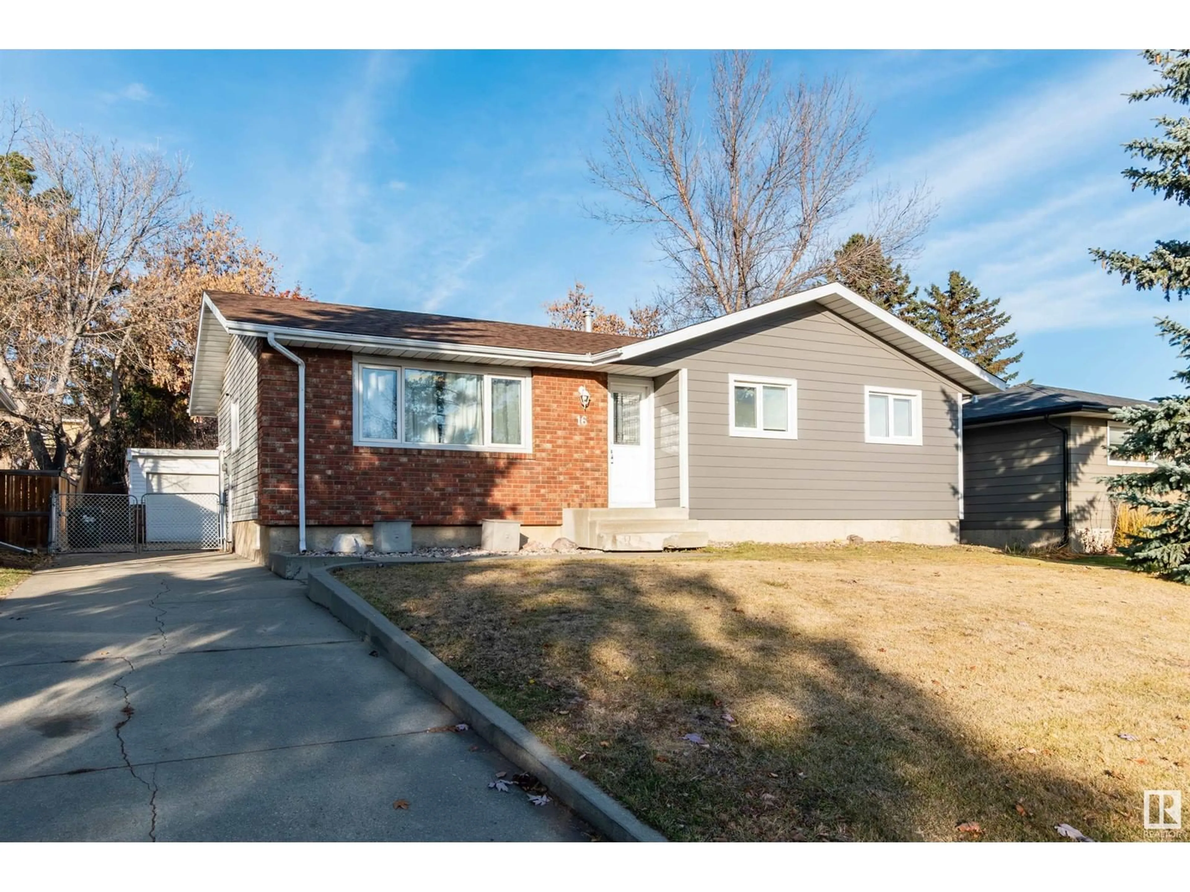 Frontside or backside of a home, the fenced backyard for 16 GROVELAND RD, Sherwood Park Alberta T8A3G4