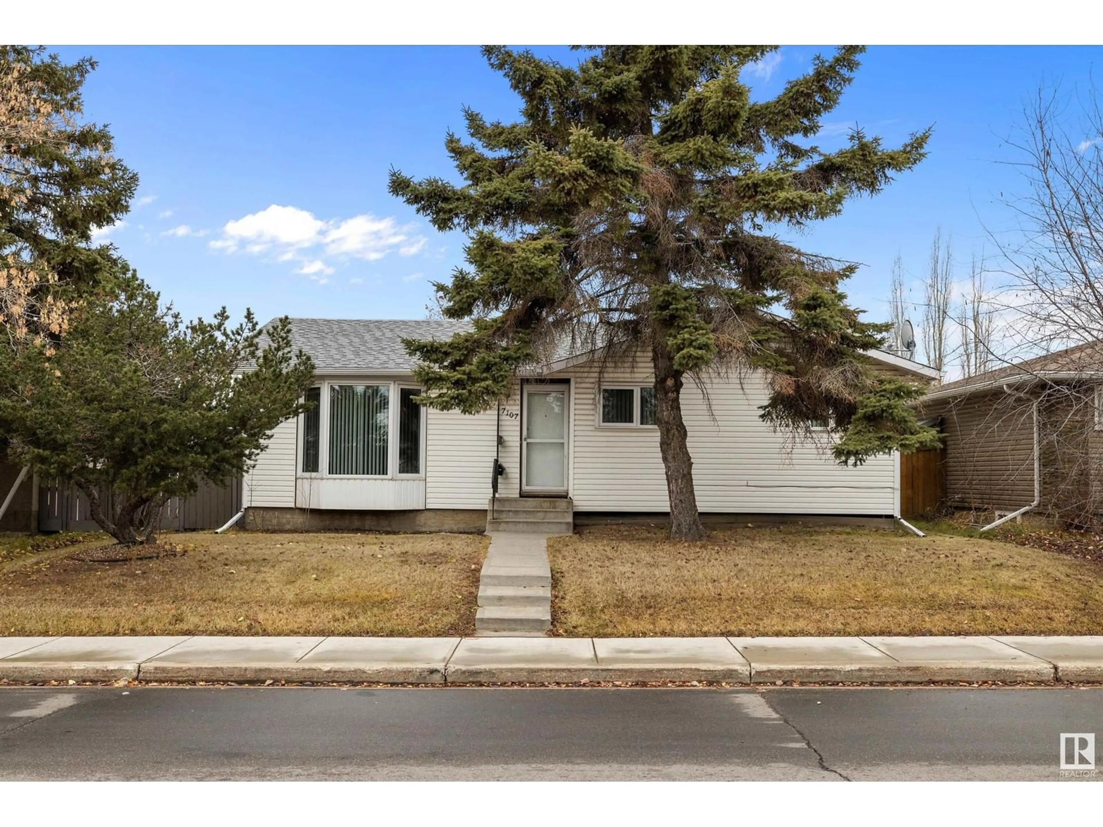 Frontside or backside of a home, cottage for 7107 144 AV NW, Edmonton Alberta T5C2R6