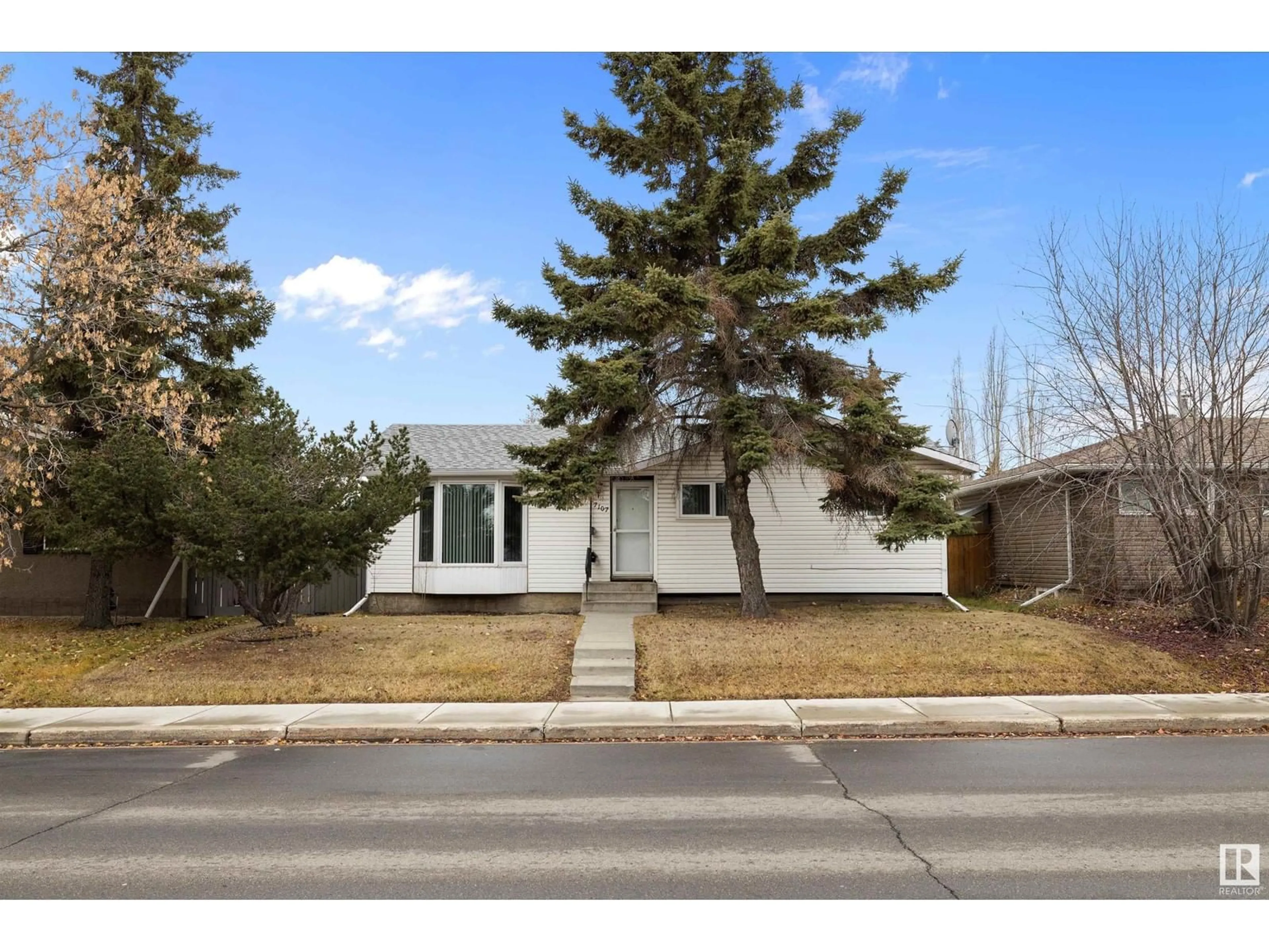 Frontside or backside of a home, the street view for 7107 144 AV NW, Edmonton Alberta T5C2R6