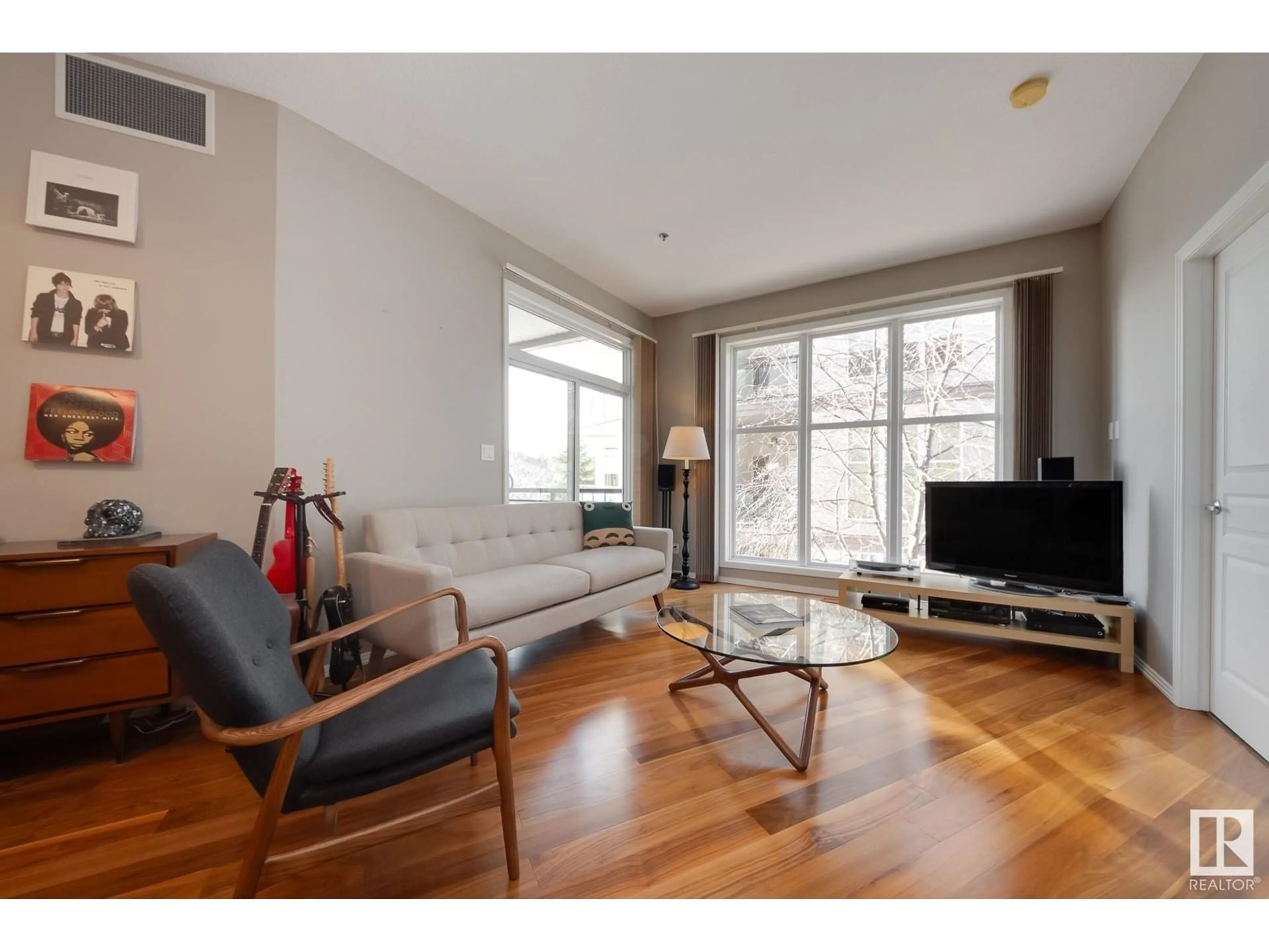 Living room, wood floors for #230 4831 104A ST NW, Edmonton Alberta T6H0R5