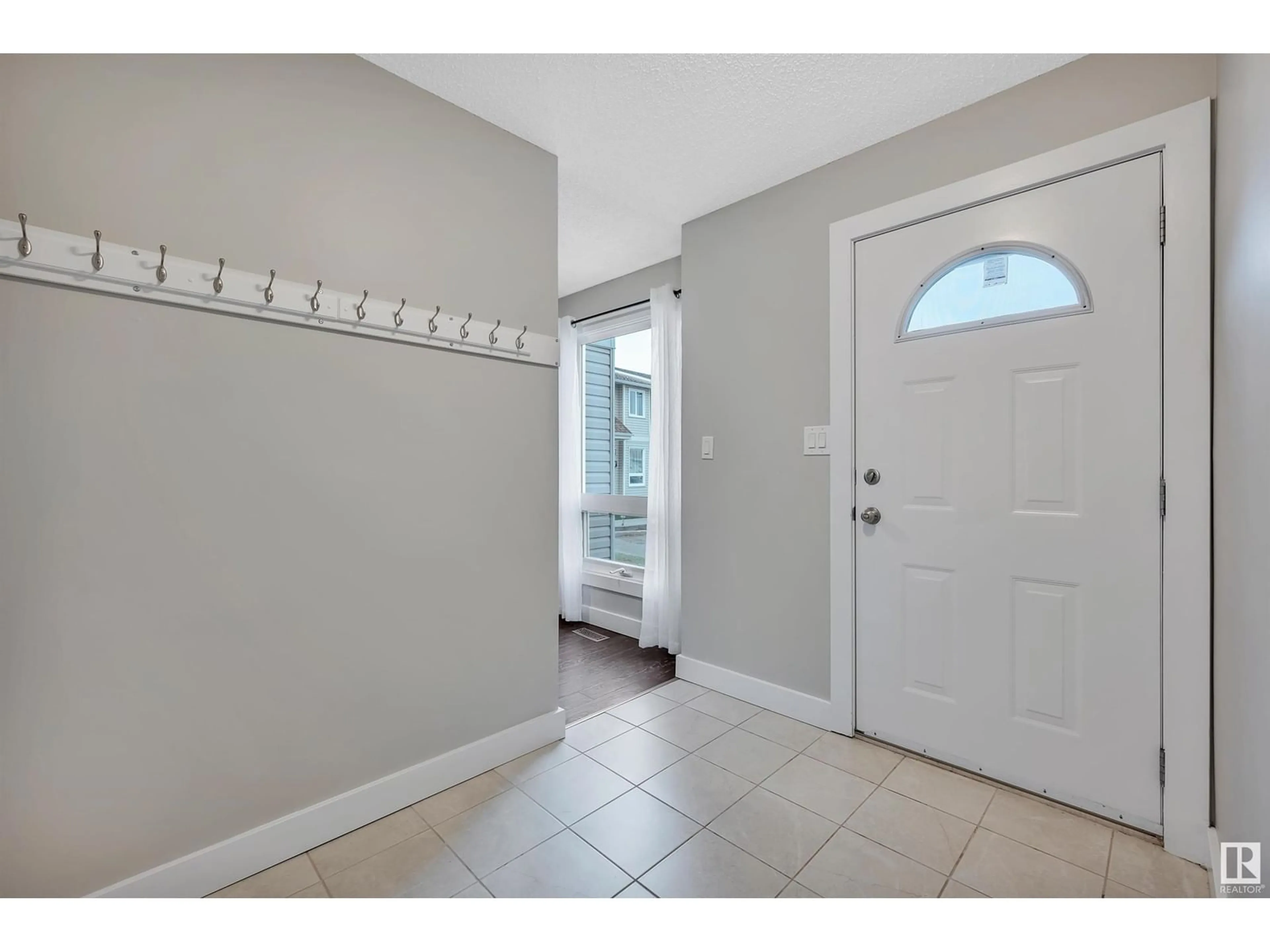 Indoor entryway, wood floors for 447 DUNLUCE RD NW, Edmonton Alberta T5X4Y5