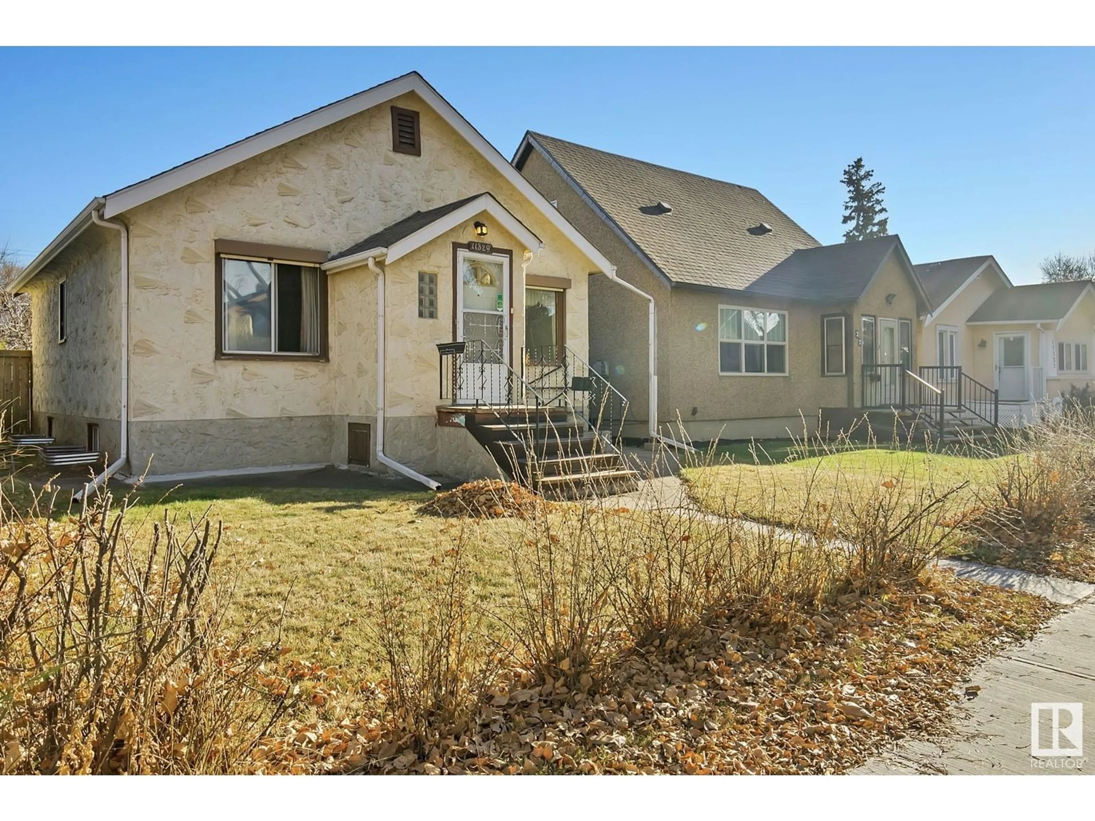 Frontside or backside of a home, cottage for 11329 94 ST NW, Edmonton Alberta T5G1H2