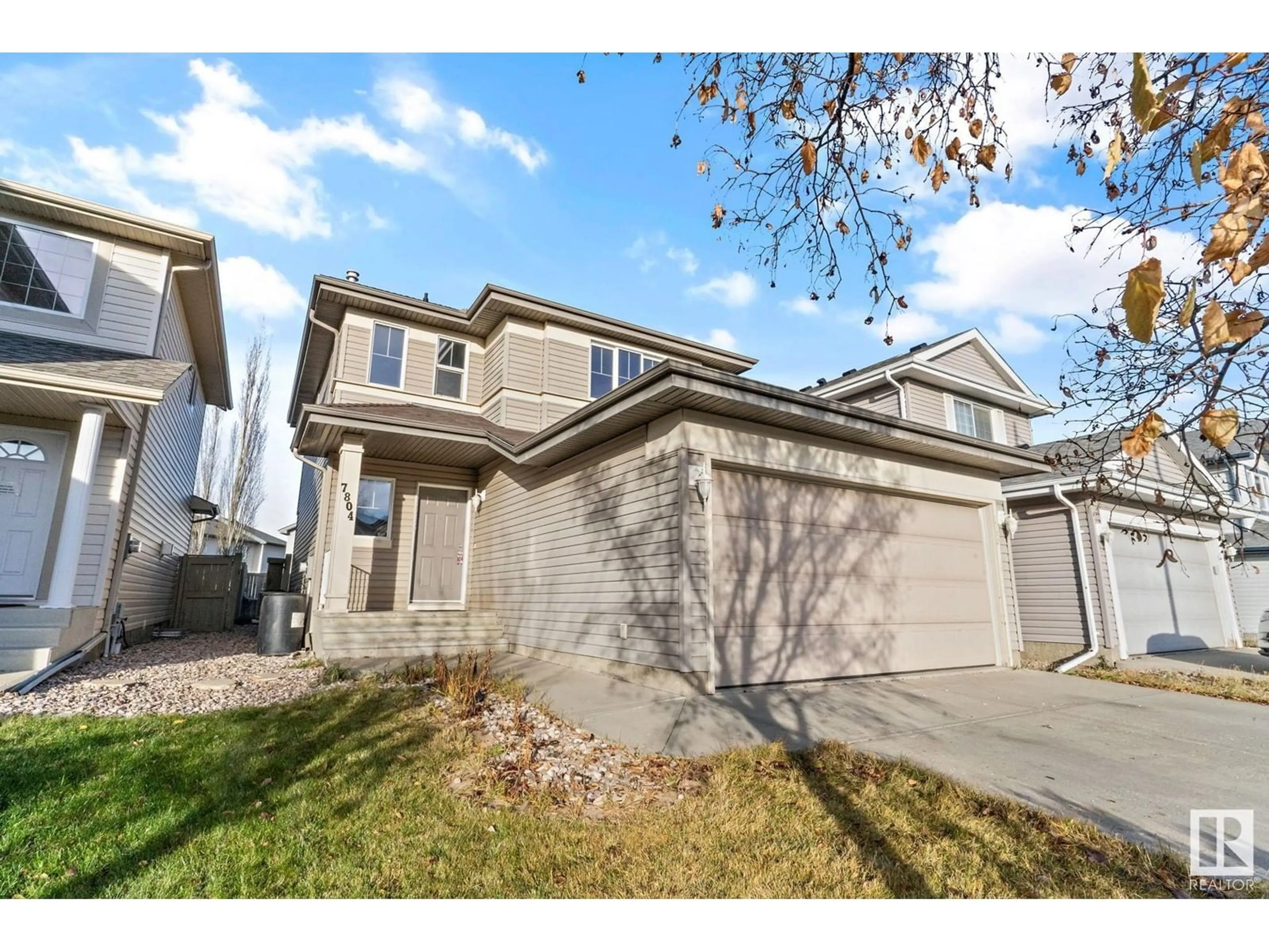 Frontside or backside of a home, the street view for 7804 8 AV SW, Edmonton Alberta T6X0A4