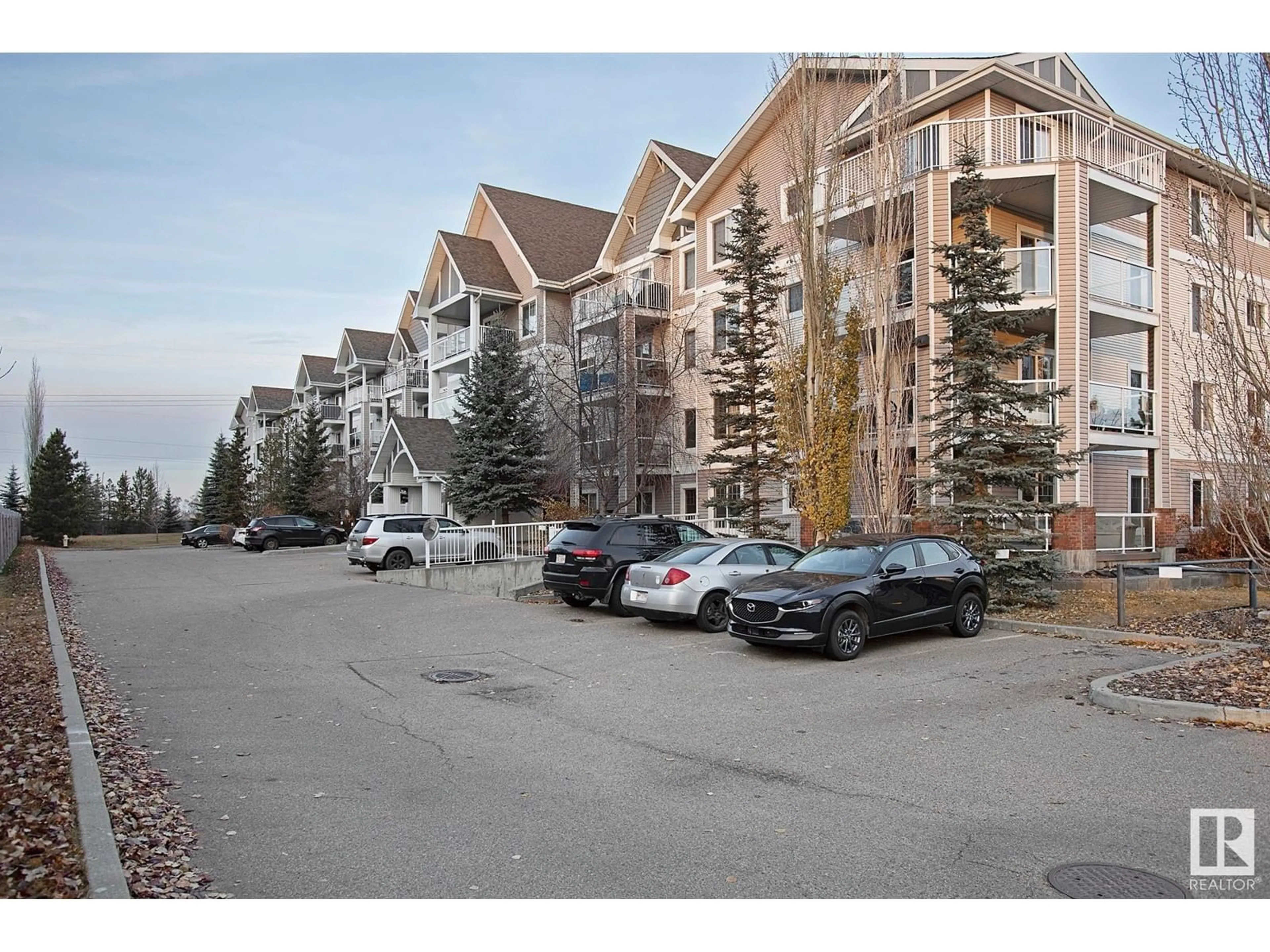 A pic from exterior of the house or condo, the street view for #213 13710 150 AV NW, Edmonton Alberta T6V0B2