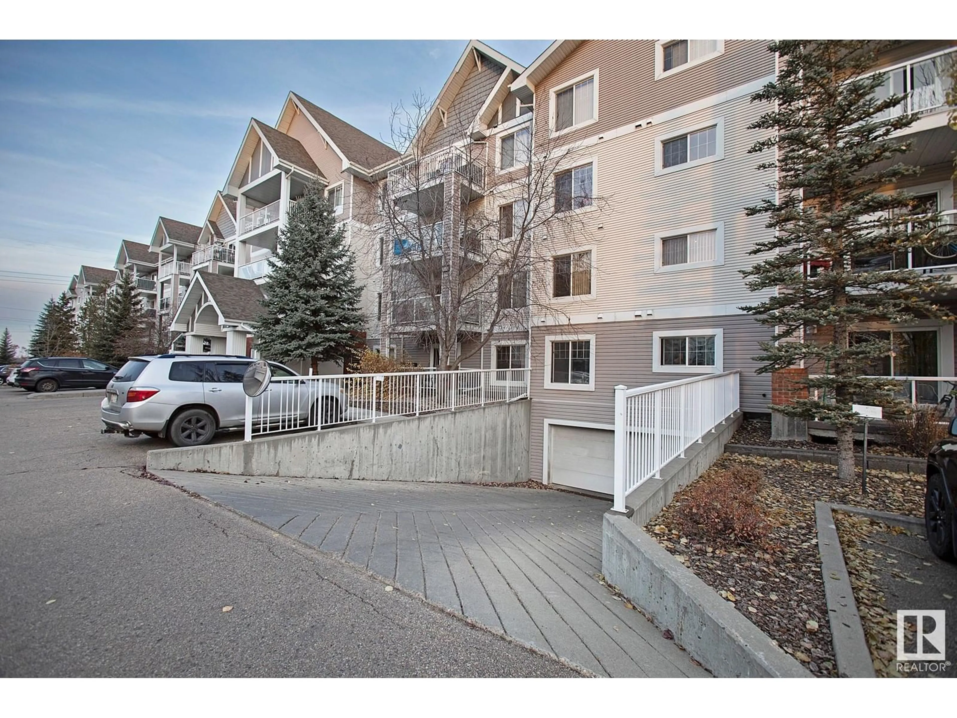 A pic from exterior of the house or condo, the street view for #213 13710 150 AV NW, Edmonton Alberta T6V0B2