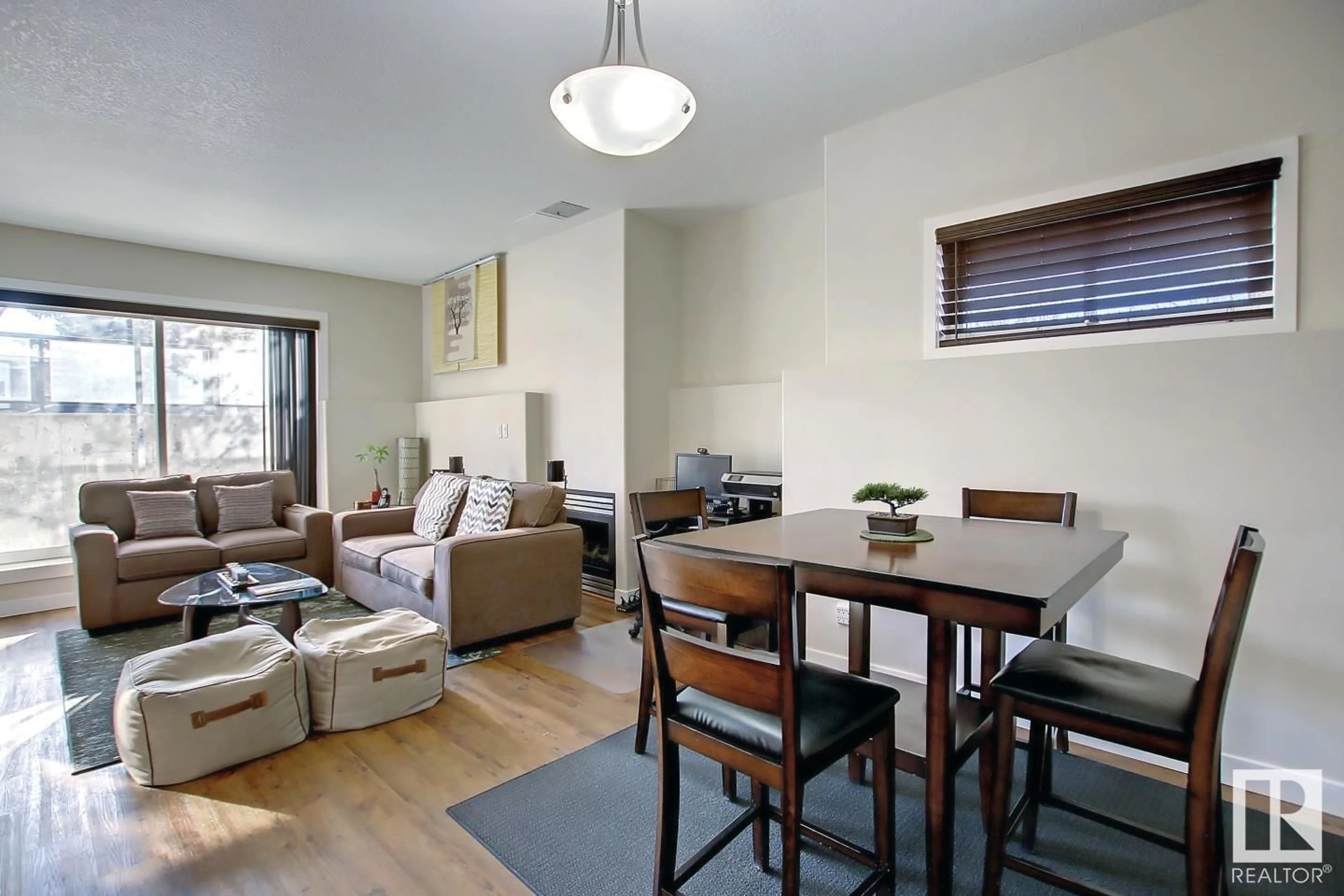 Living room, wood floors for #102 10905 109 ST NW, Edmonton Alberta T5H3C2