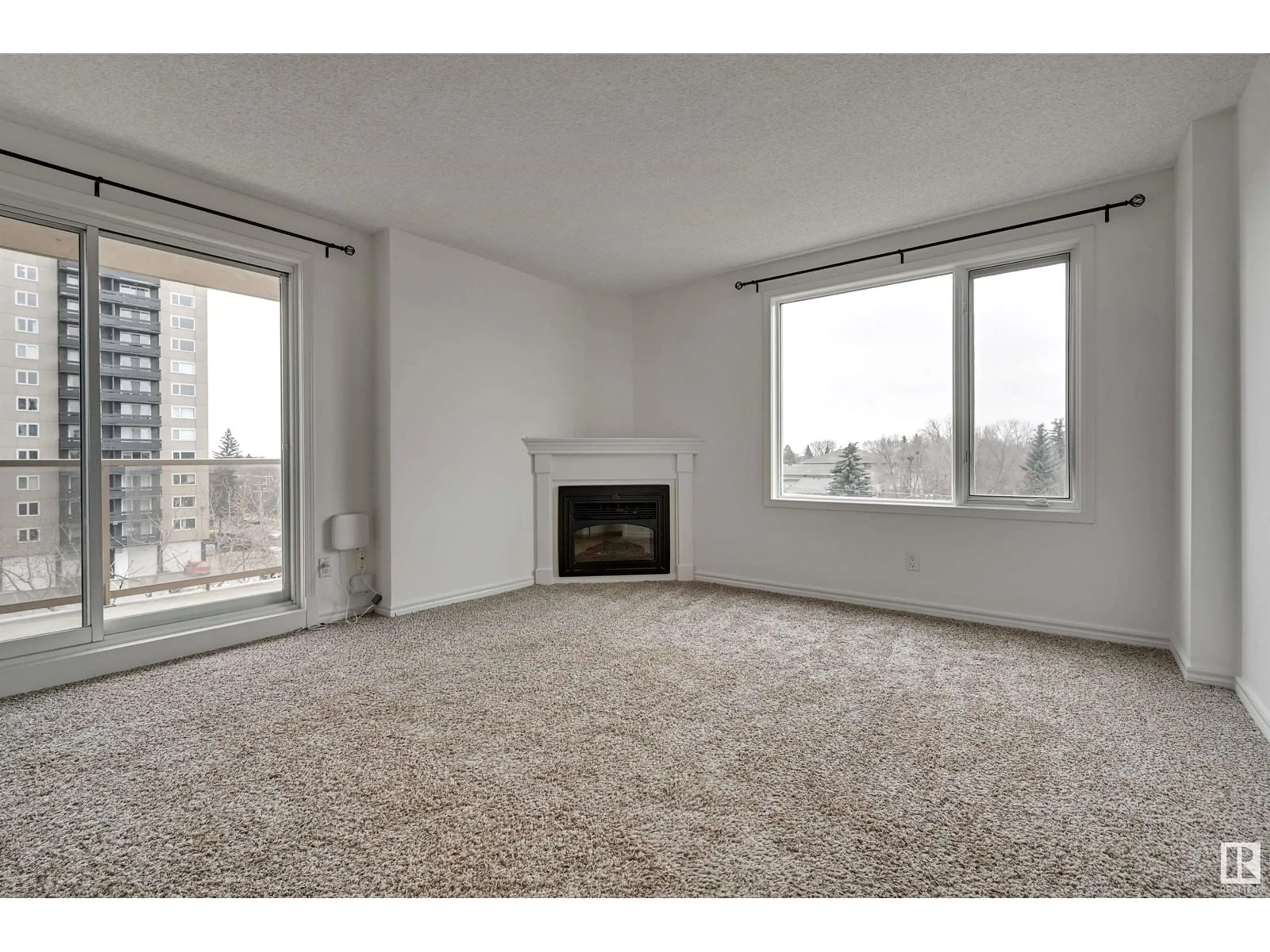 Living room, carpet floors for #505 10649 SASKATCHEWAN DR NW, Edmonton Alberta T6E6S8