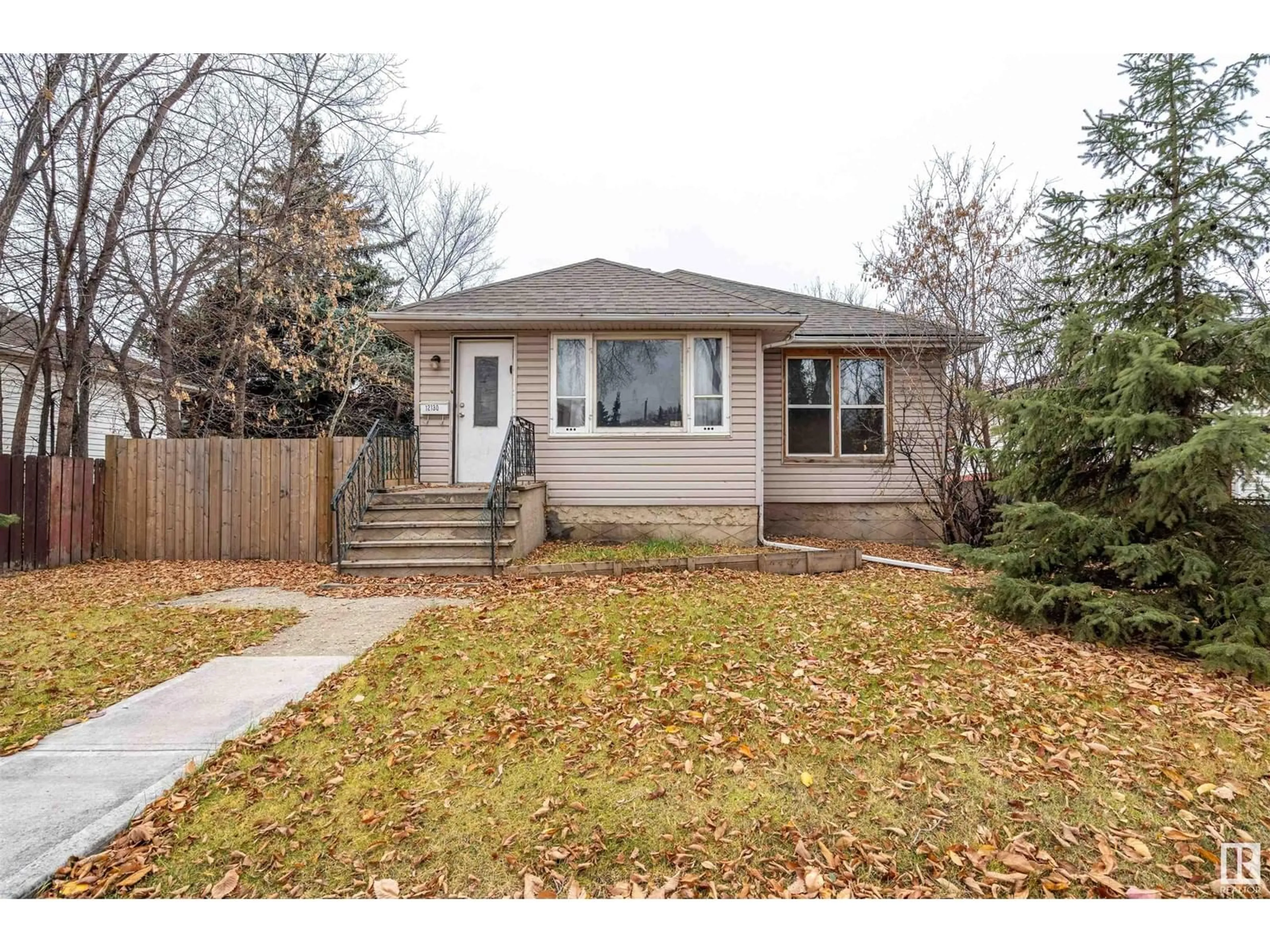 Frontside or backside of a home, cottage for 12130 63 ST NW, Edmonton Alberta T5W4G6