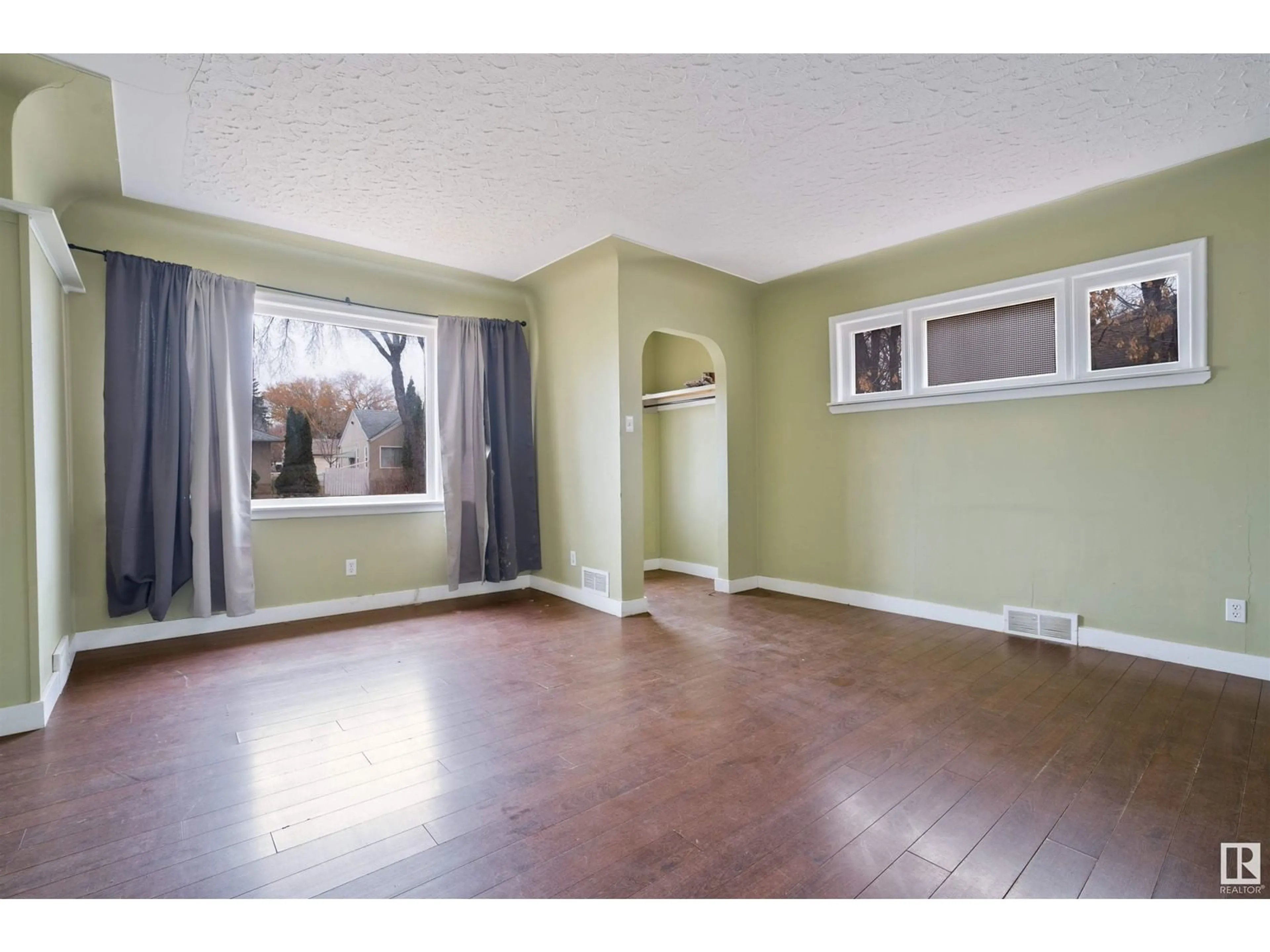 A pic of a room, wood floors for 12130 63 ST NW, Edmonton Alberta T5W4G6