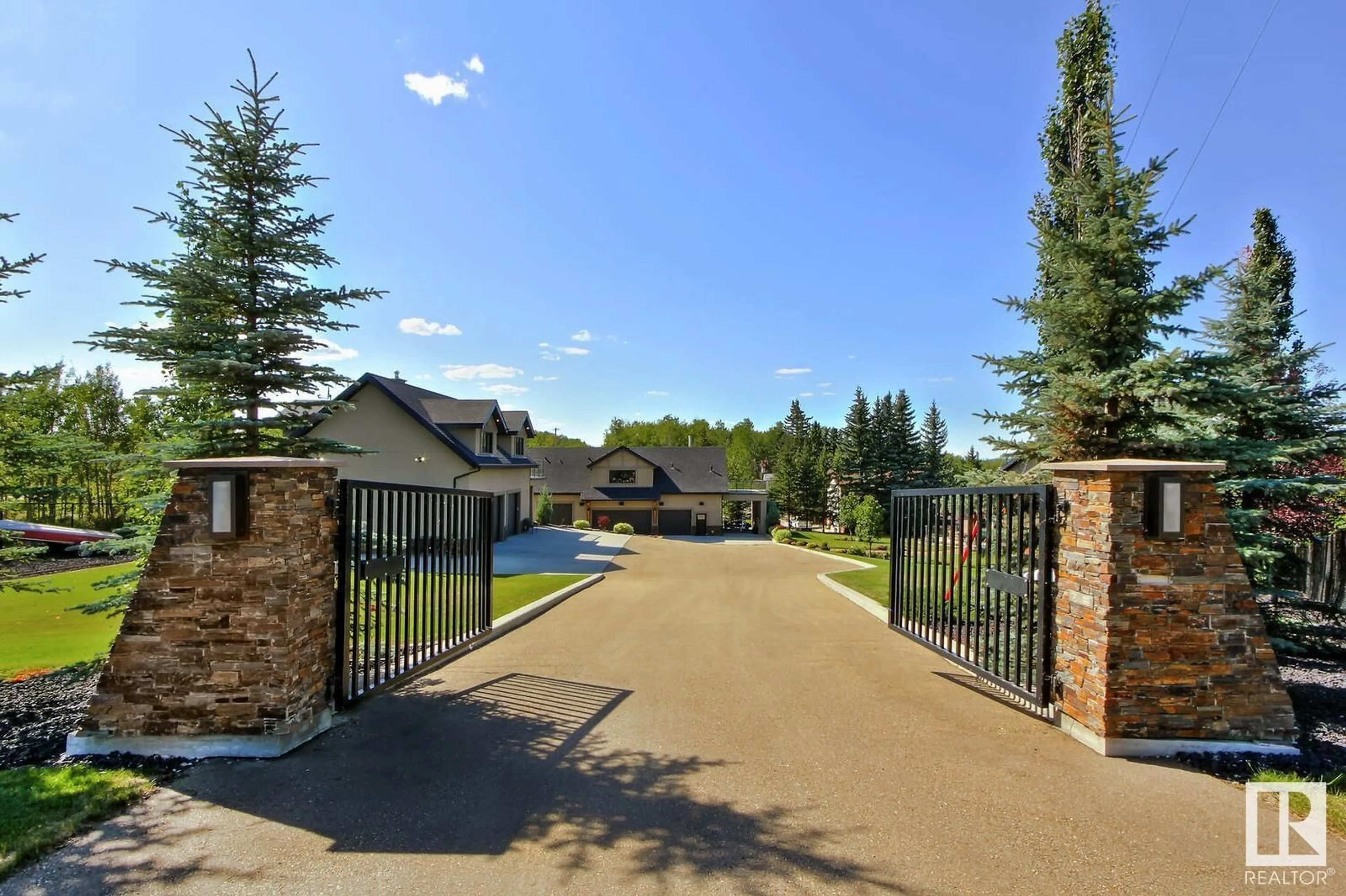 Patio, the fenced backyard for ##8 53002 RGE ROAD 54, Rural Parkland County Alberta T0E0V0