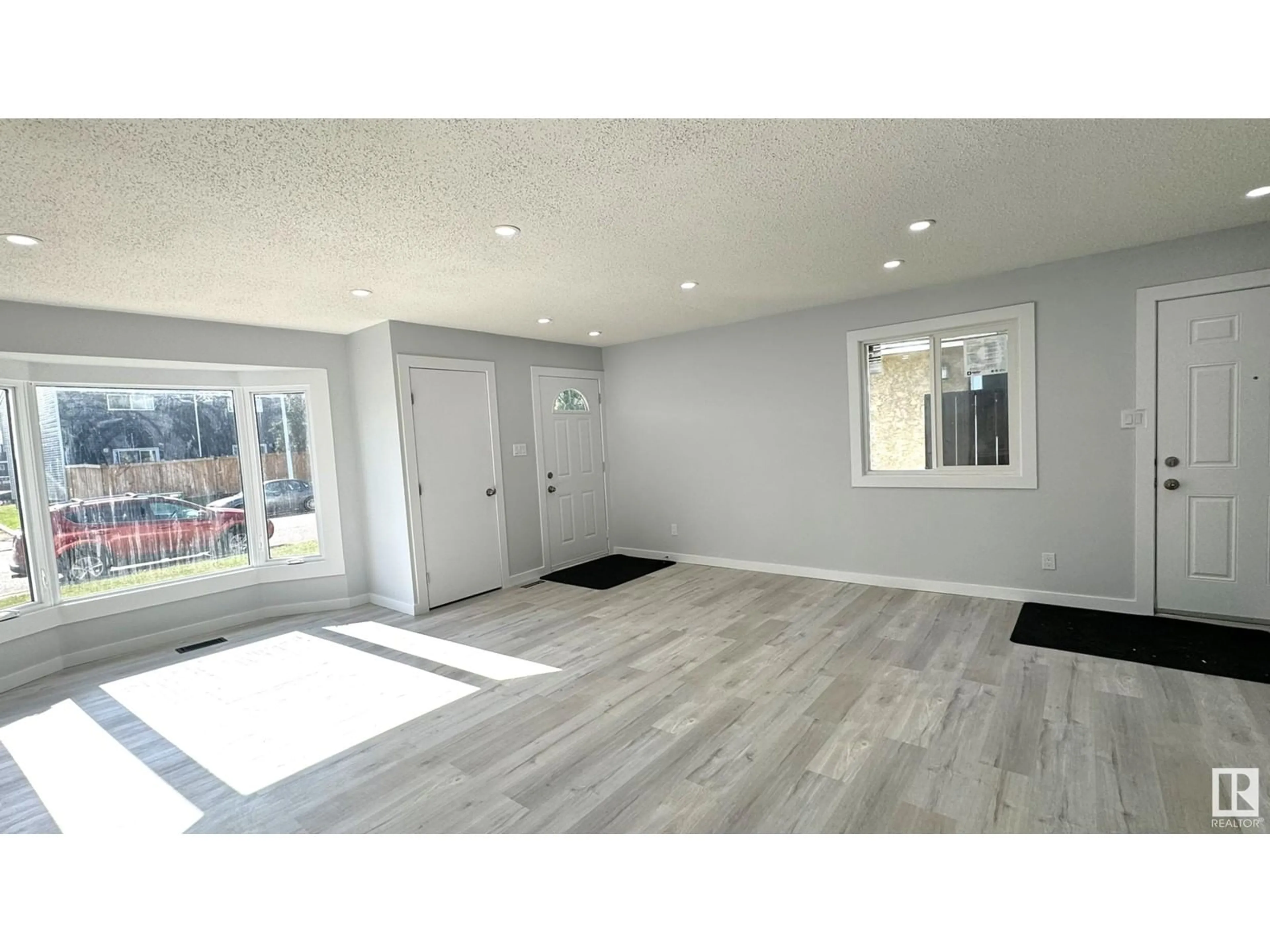 A pic of a room, wood floors for 500 DUNLUCE RD NW, Edmonton Alberta T5X5C8