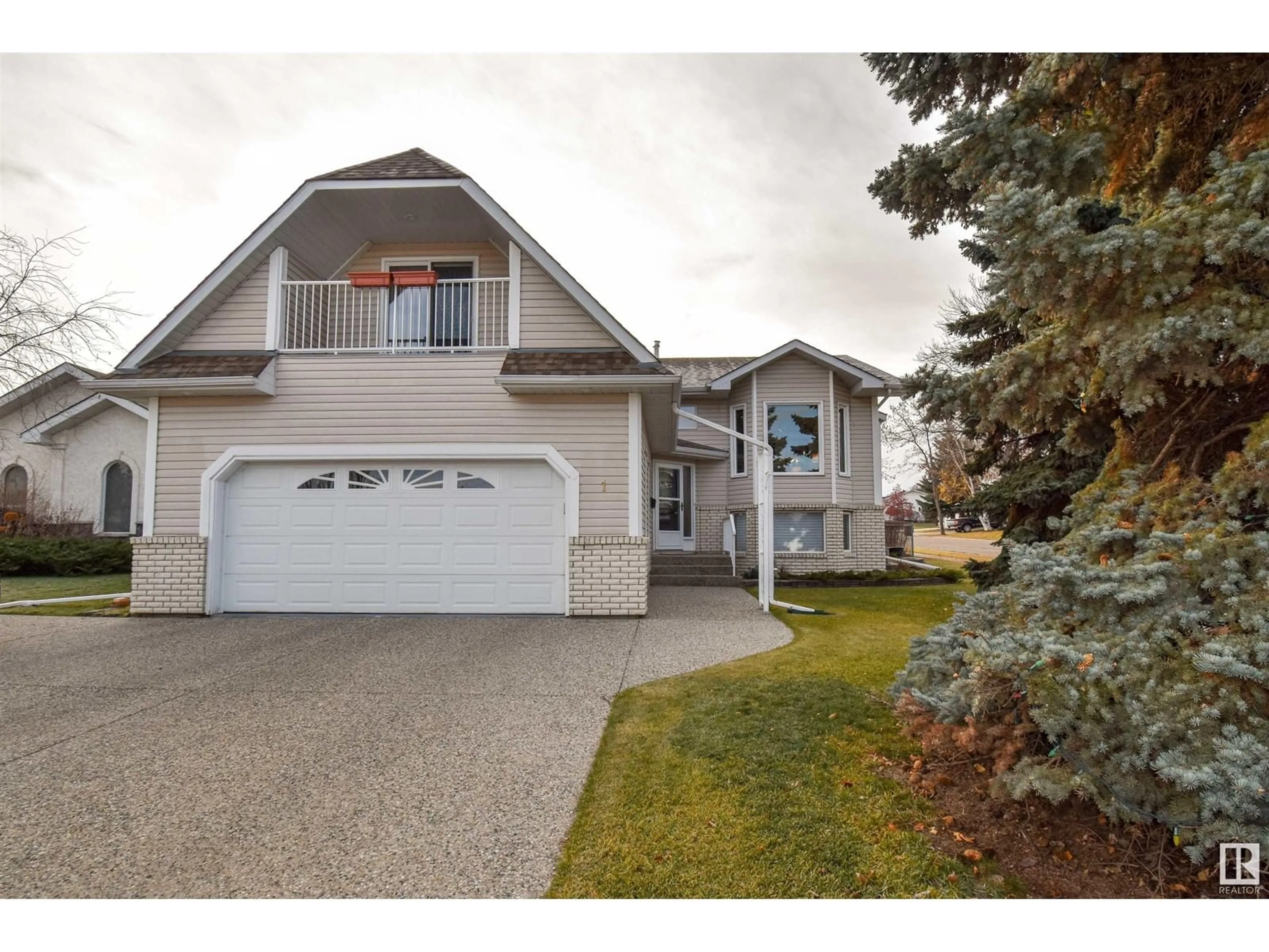 Frontside or backside of a home, the street view for 1 Fieldstone CL, Spruce Grove Alberta T7X3C3