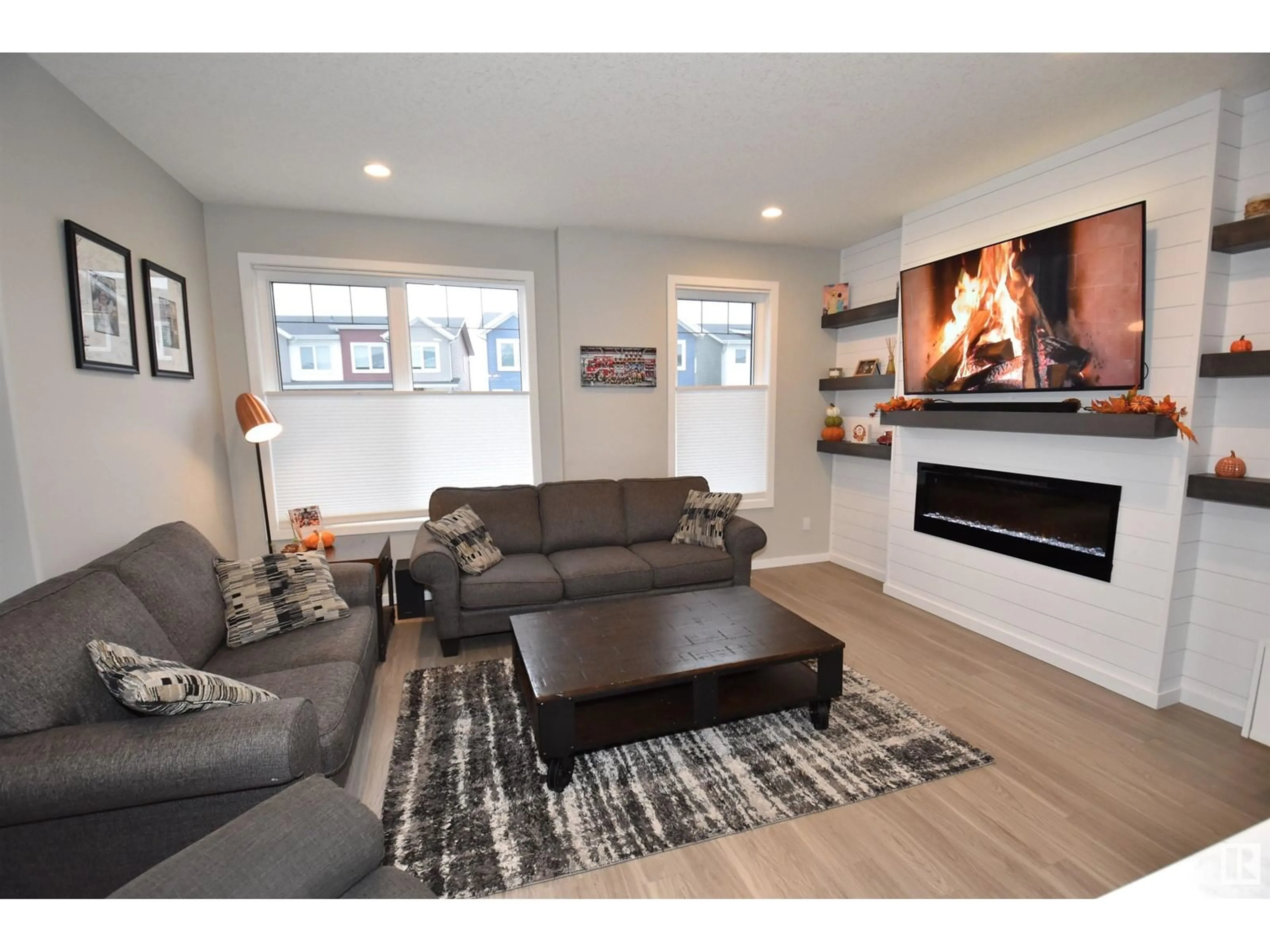 Living room, wood floors for 1910 TANAGER PL NW, Edmonton Alberta T5S0M5