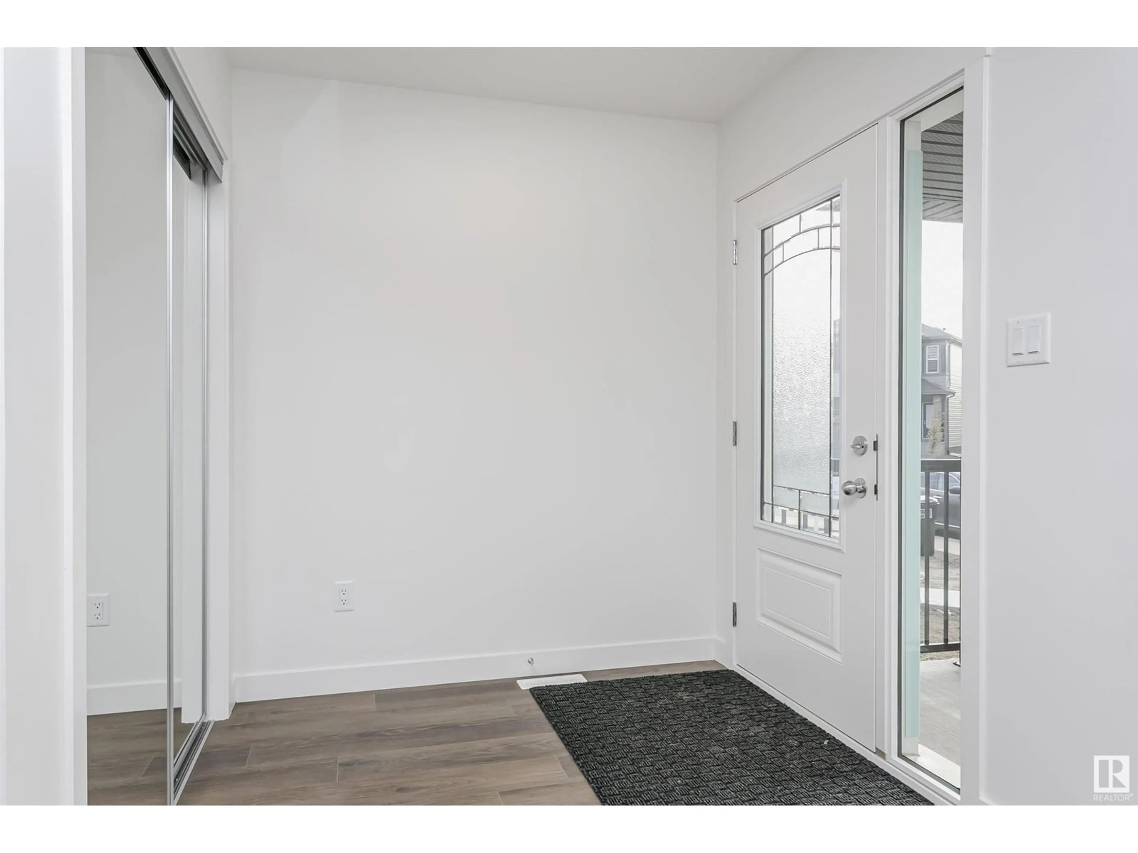 Indoor entryway, wood floors for 9530 CARSON BN SW, Edmonton Alberta T6W5G7