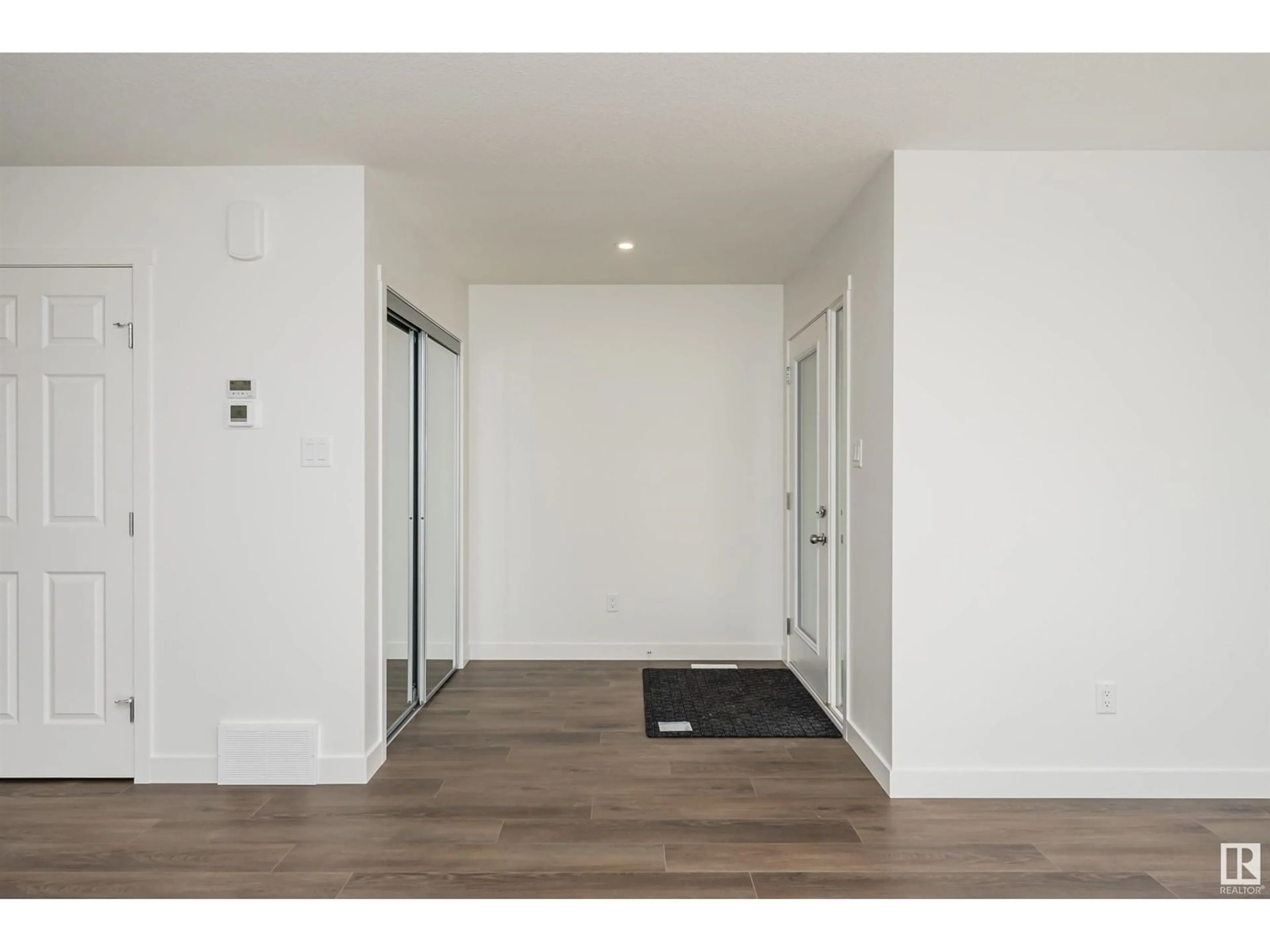 Indoor entryway, wood floors for 9554 CARSON BEND BN SW, Edmonton Alberta T6W5H6