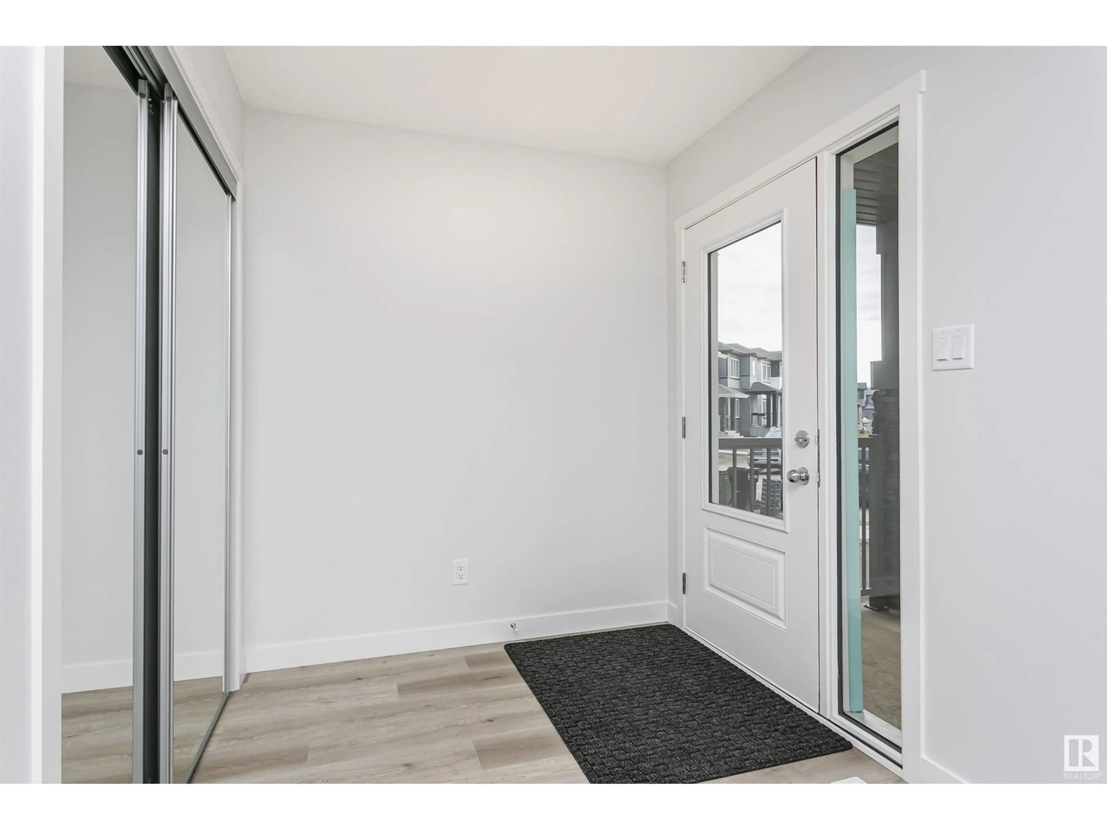 Indoor entryway, wood floors for 9564 CARSON BEND BN SW, Edmonton Alberta T6W5H6