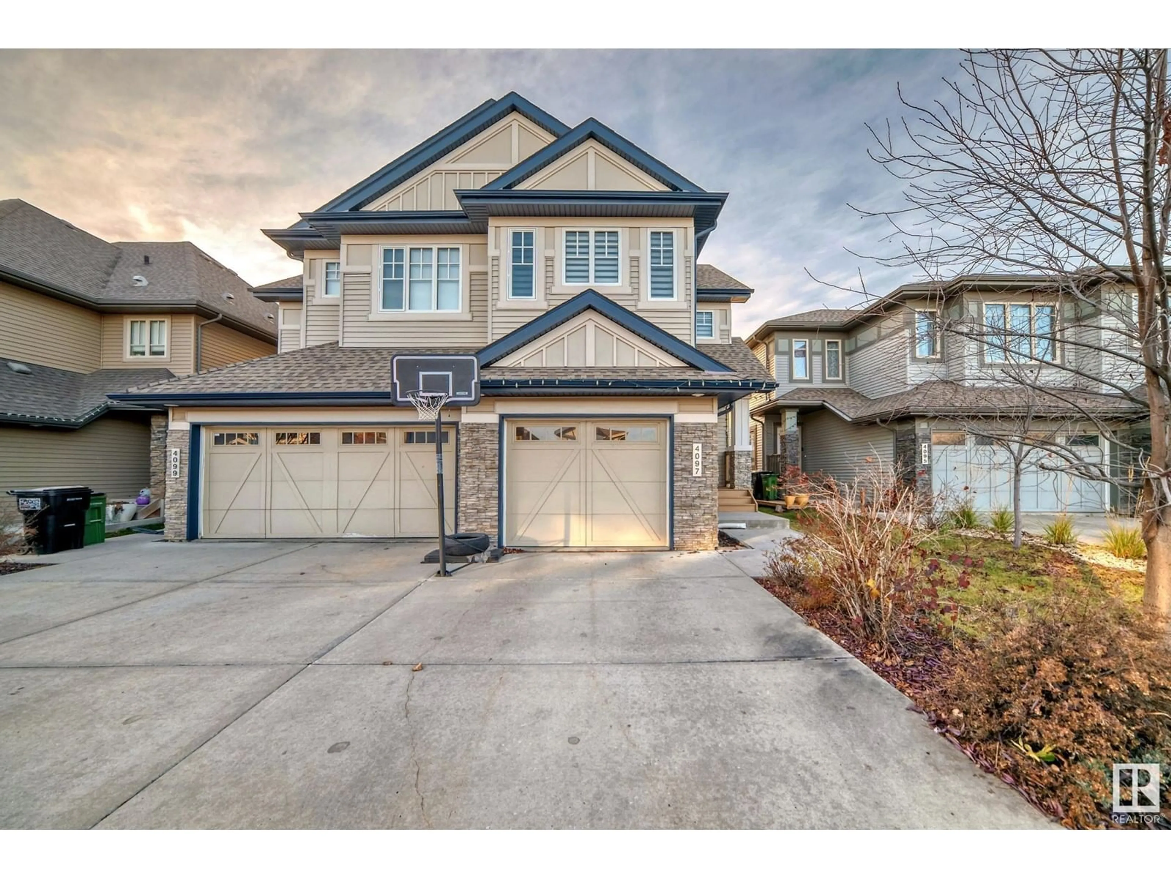 Frontside or backside of a home, the street view for 4097 Allan Cress SW, Edmonton Alberta T6W2J9