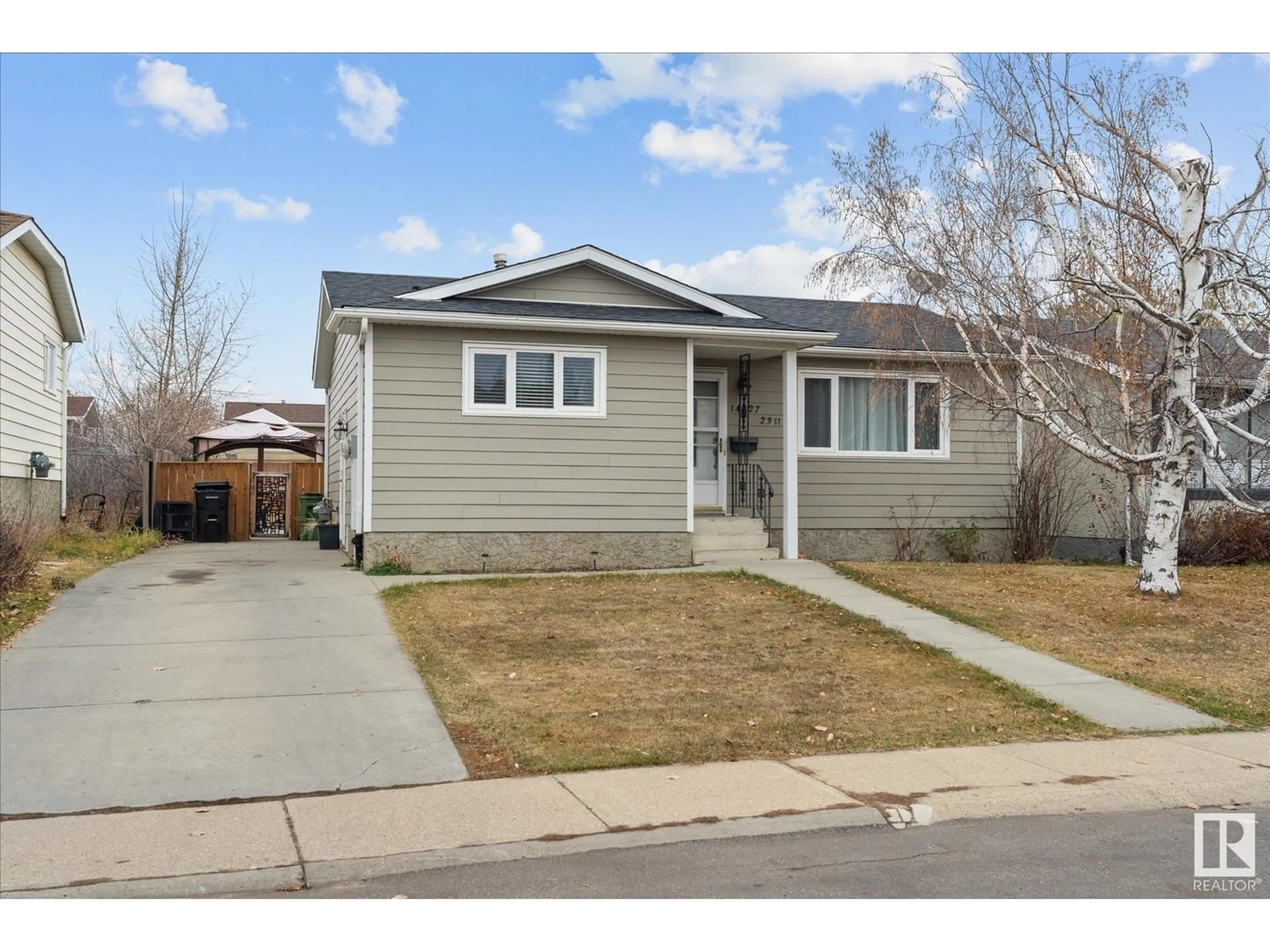 Frontside or backside of a home, the street view for 14027 23 ST NW, Edmonton Alberta T5Y1C3