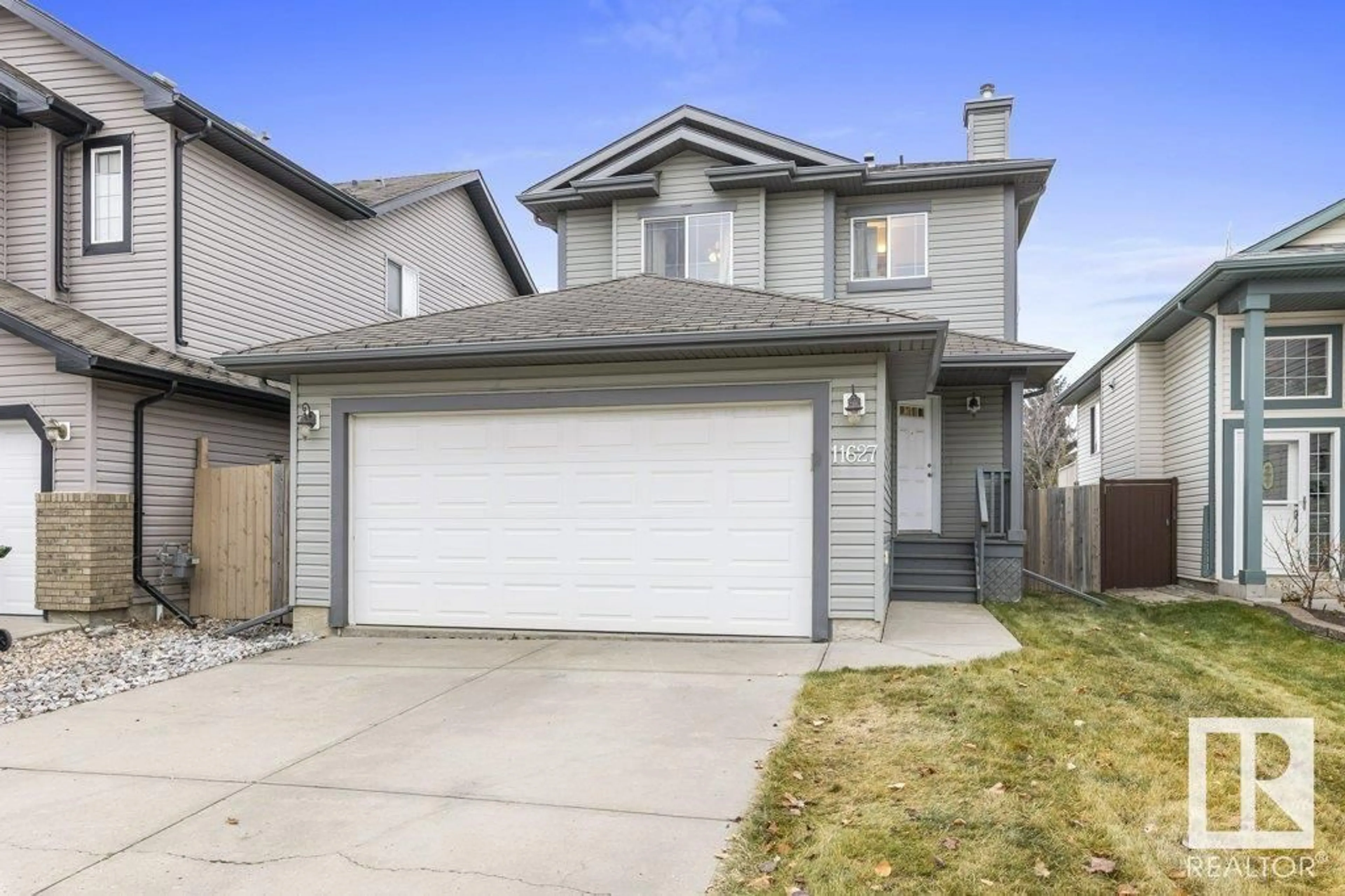 Frontside or backside of a home, the fenced backyard for 11627 167A AV NW, Edmonton Alberta T5X6J5