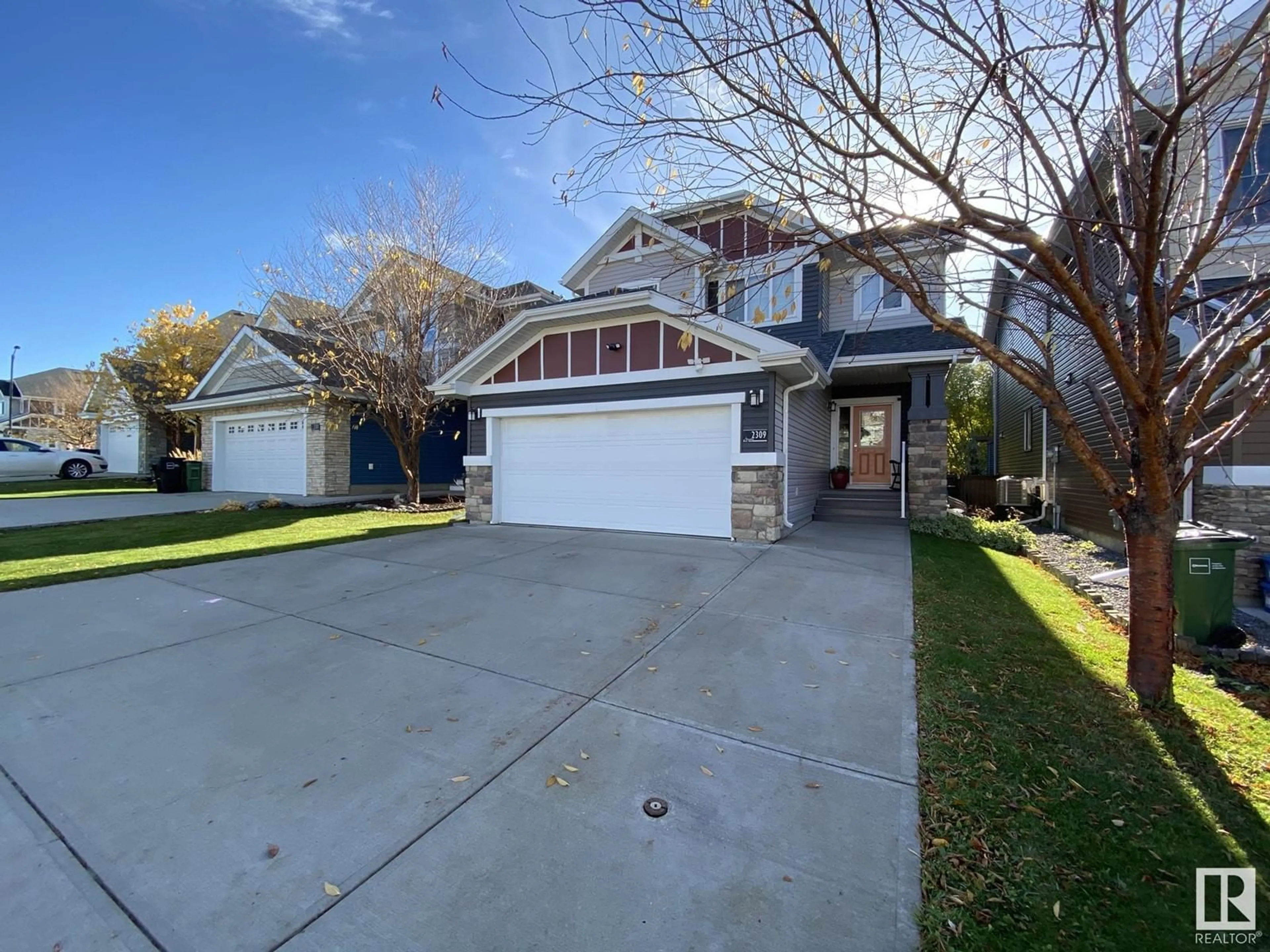 Frontside or backside of a home, the street view for 2309 SPARROW CR NW, Edmonton Alberta T5S0G8