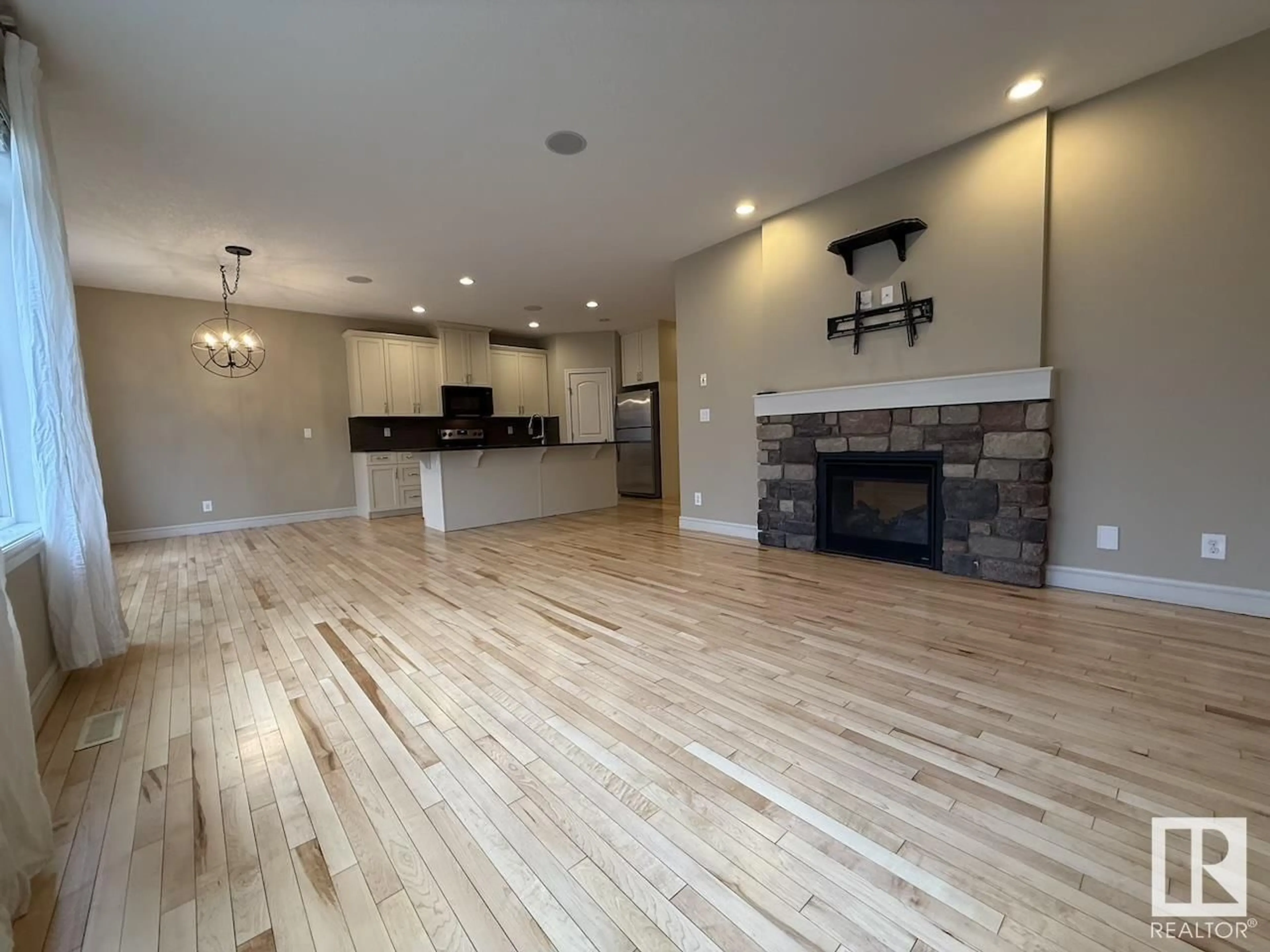 A pic of a room, wood floors for 2309 SPARROW CR NW, Edmonton Alberta T5S0G8