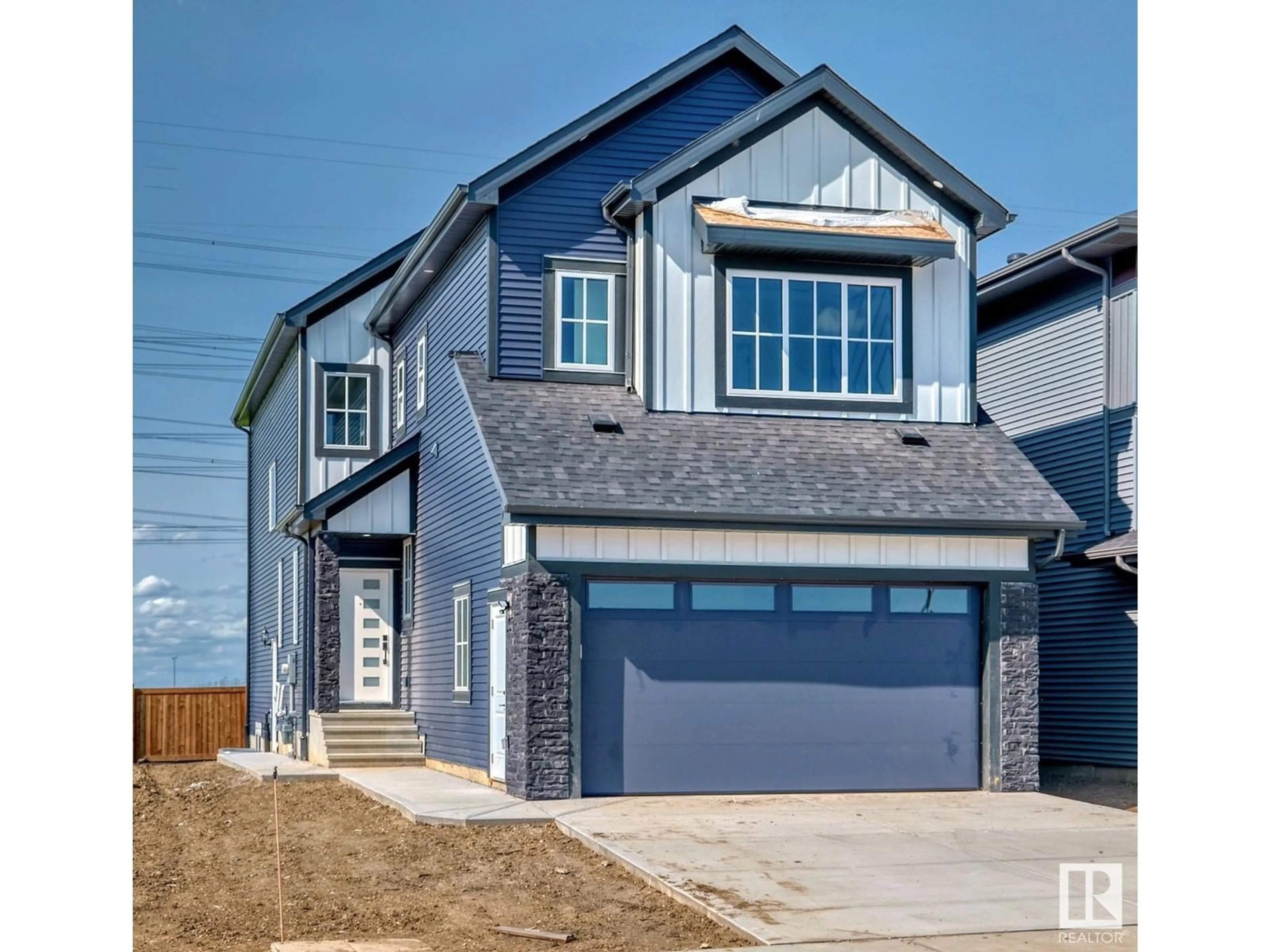 Frontside or backside of a home, the street view for 2804 1 AV SW, Edmonton Alberta T6X3E3