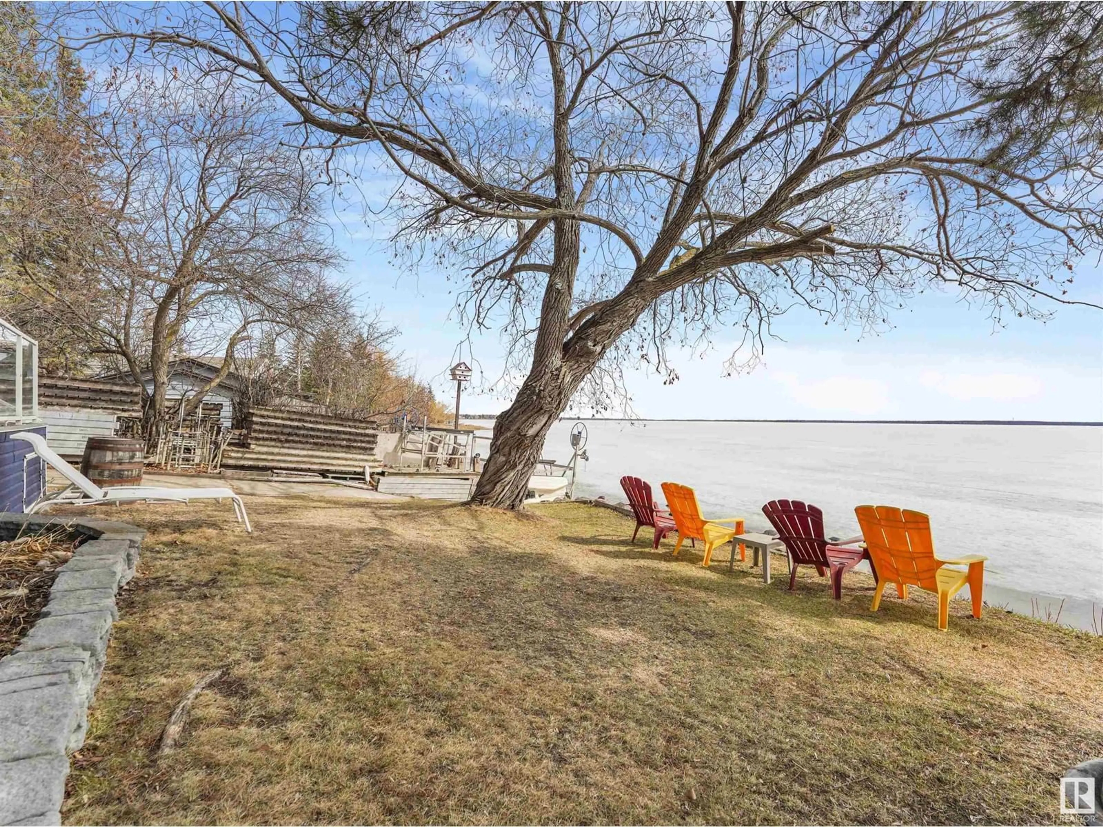 Patio, the fenced backyard for 809 8 ST, Rural Lac Ste. Anne County Alberta T0E1A0