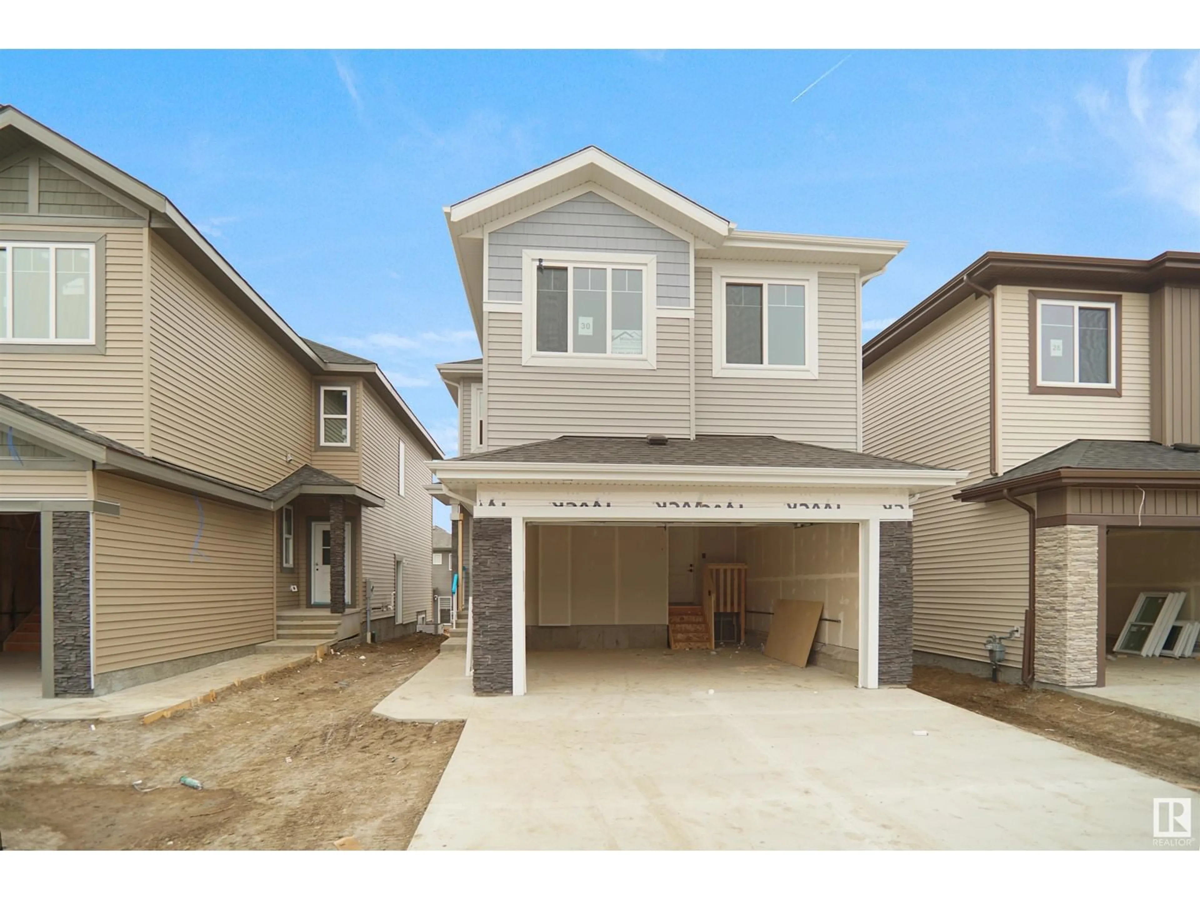 Frontside or backside of a home, the street view for 30 Ashbury Cres, Spruce Grove Alberta T7X3C6