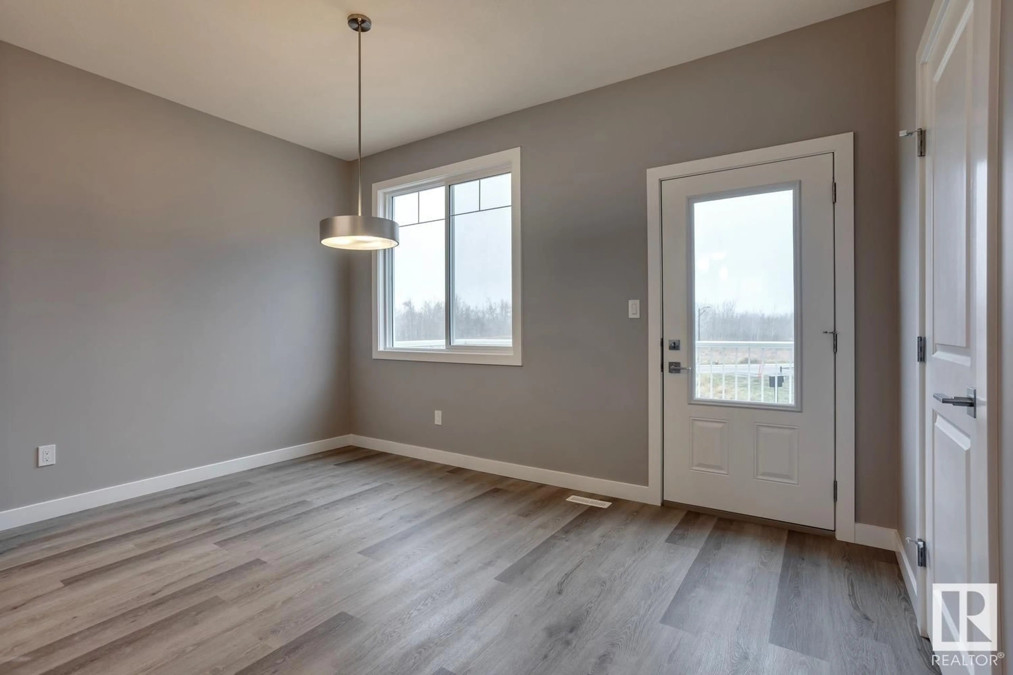 A pic of a room, wood floors for #60 13139 205 ST NW, Edmonton Alberta T5S0N1