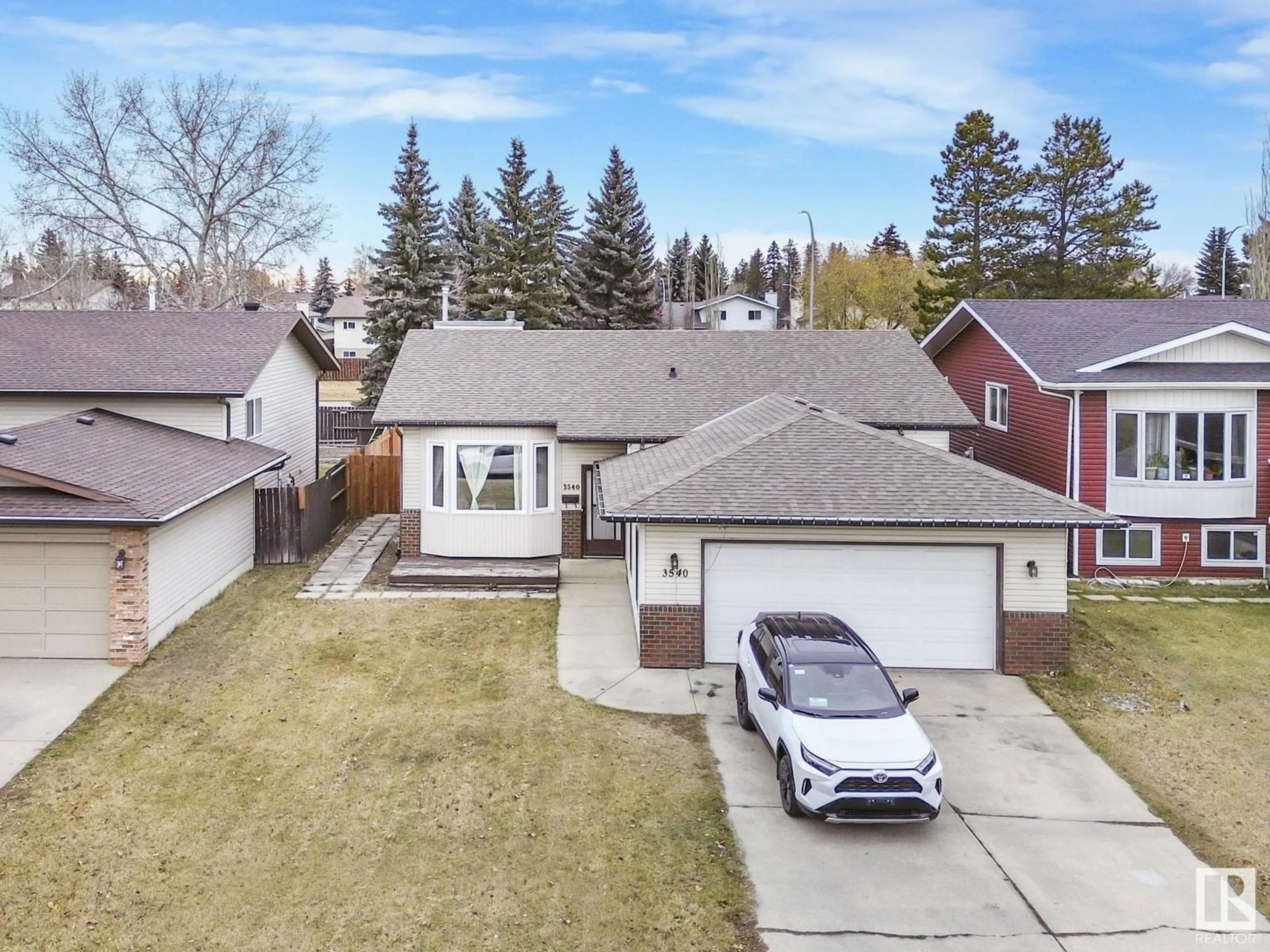 Frontside or backside of a home, the street view for 3540 33 AV NW, Edmonton Alberta T6L5G6