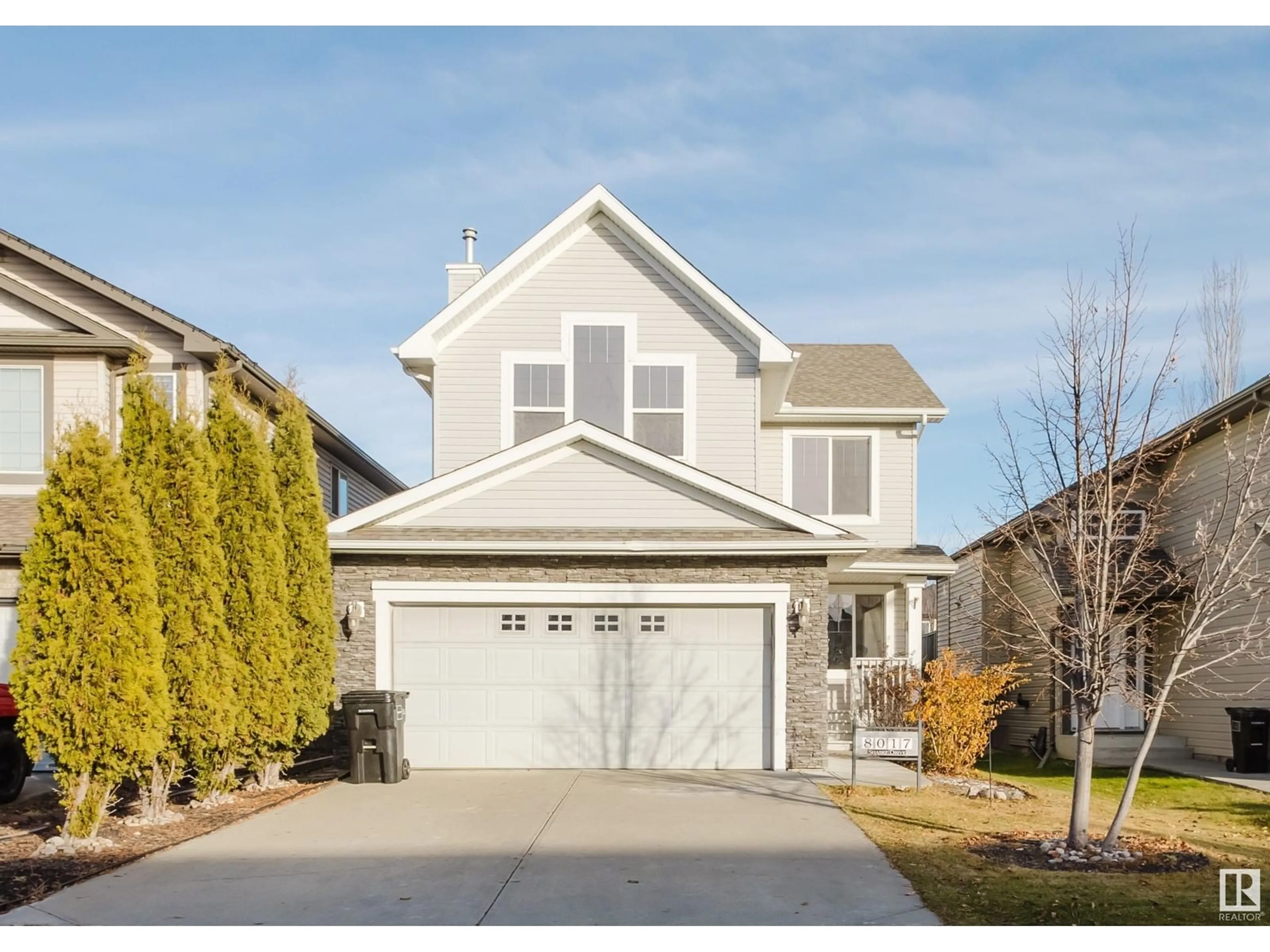 Frontside or backside of a home, the street view for 8017 SHASKE DR NW, Edmonton Alberta T6R3V9