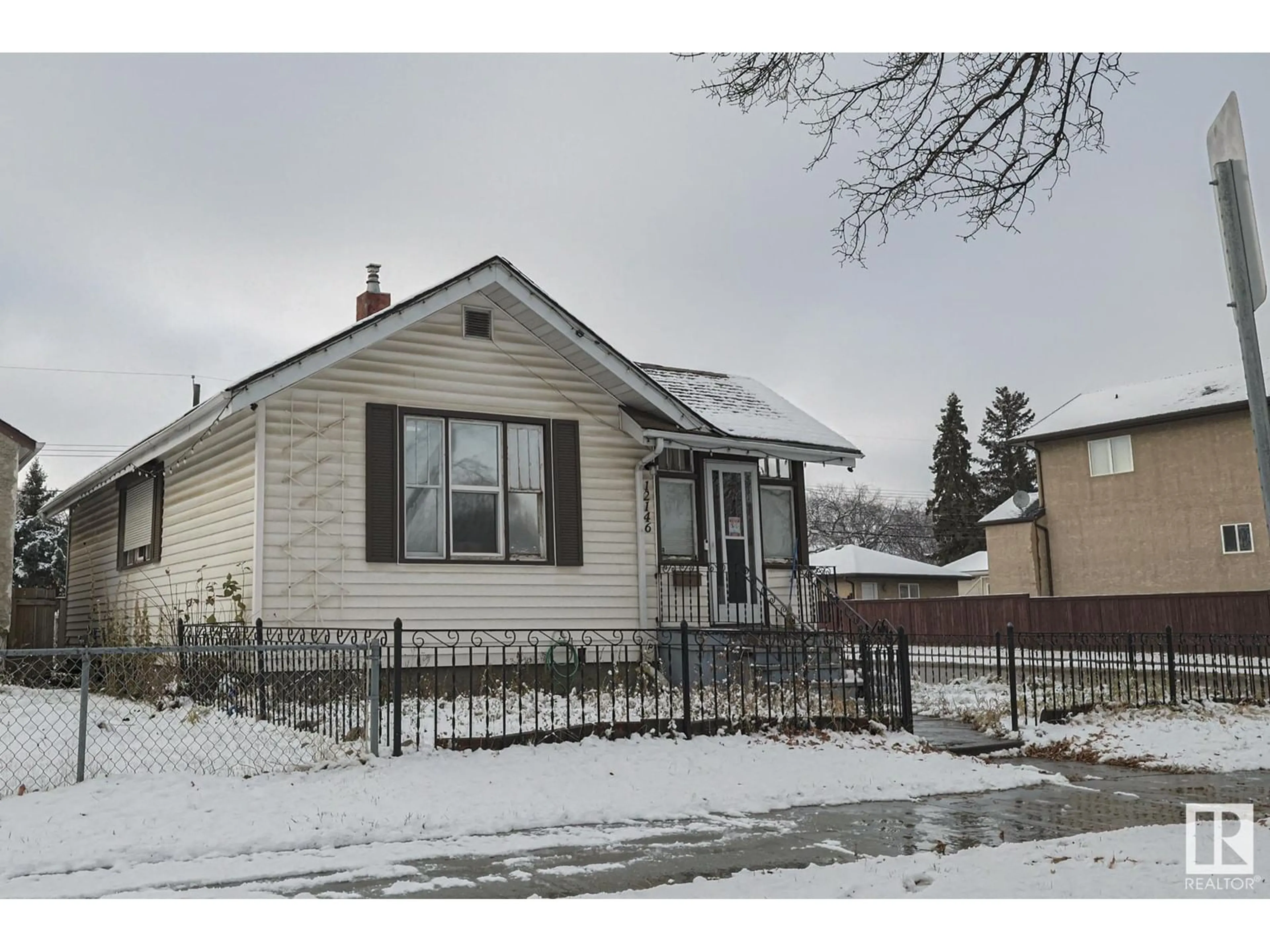 Frontside or backside of a home for 12146 94 ST NW, Edmonton Alberta T5G1J9