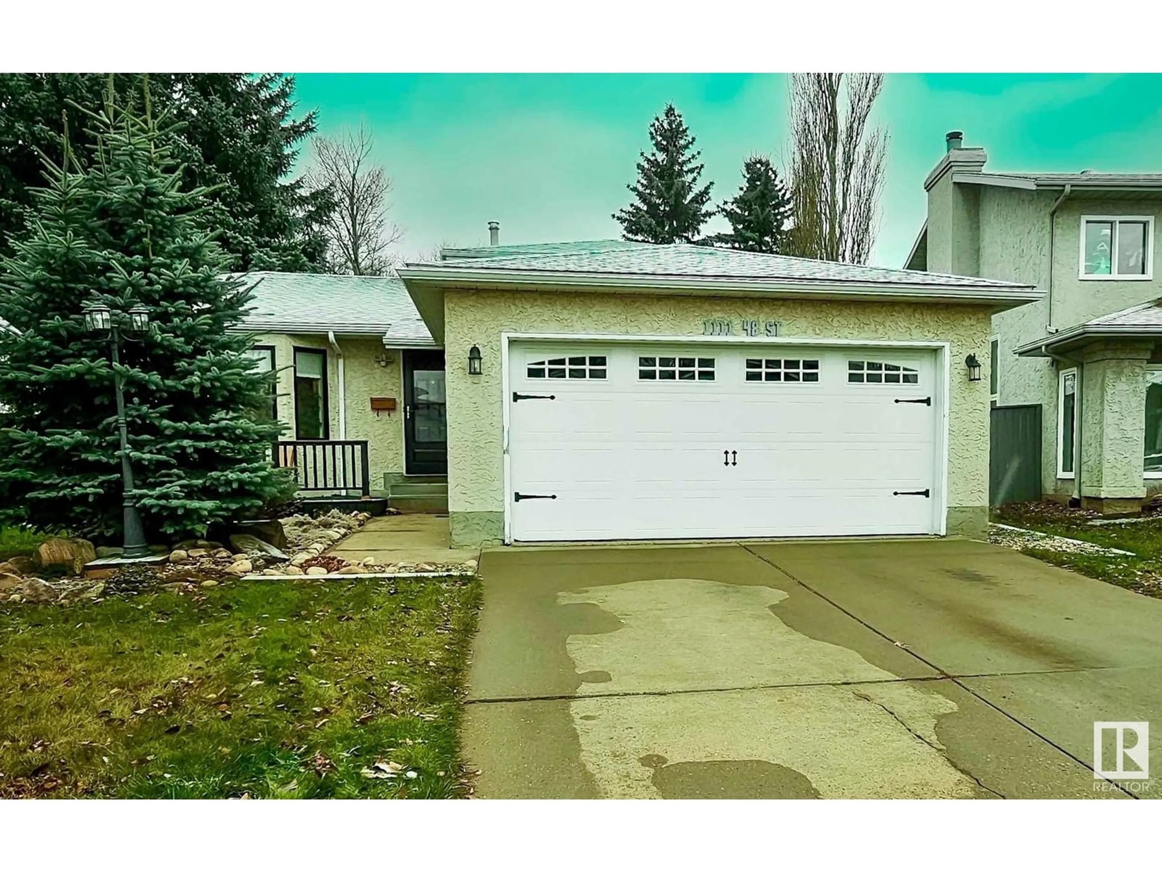 Frontside or backside of a home for 1111 48 ST NW, Edmonton Alberta T6L5V1