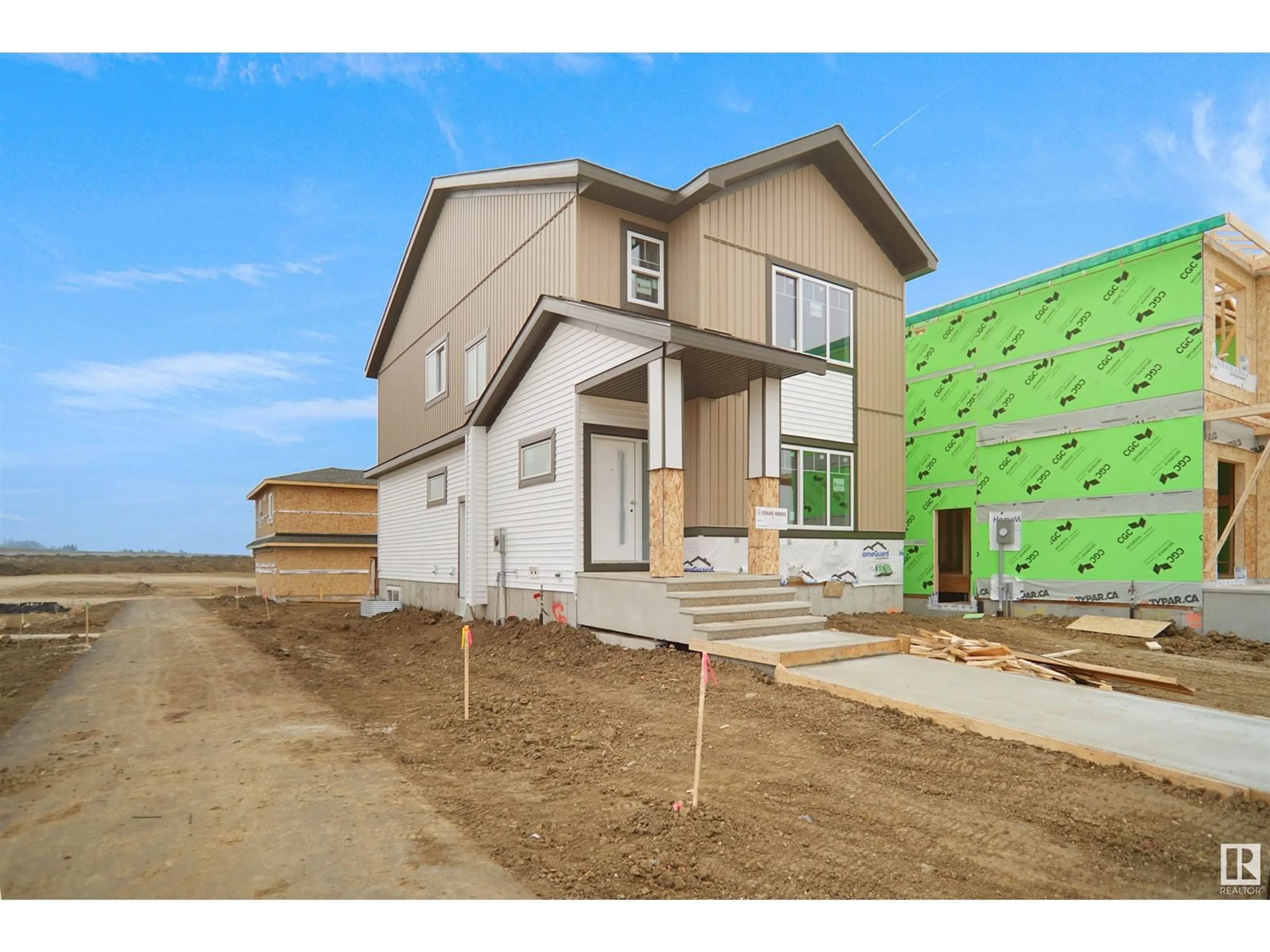 Frontside or backside of a home, the street view for 703 MATTSON DR SW, Edmonton Alberta T6X3G3