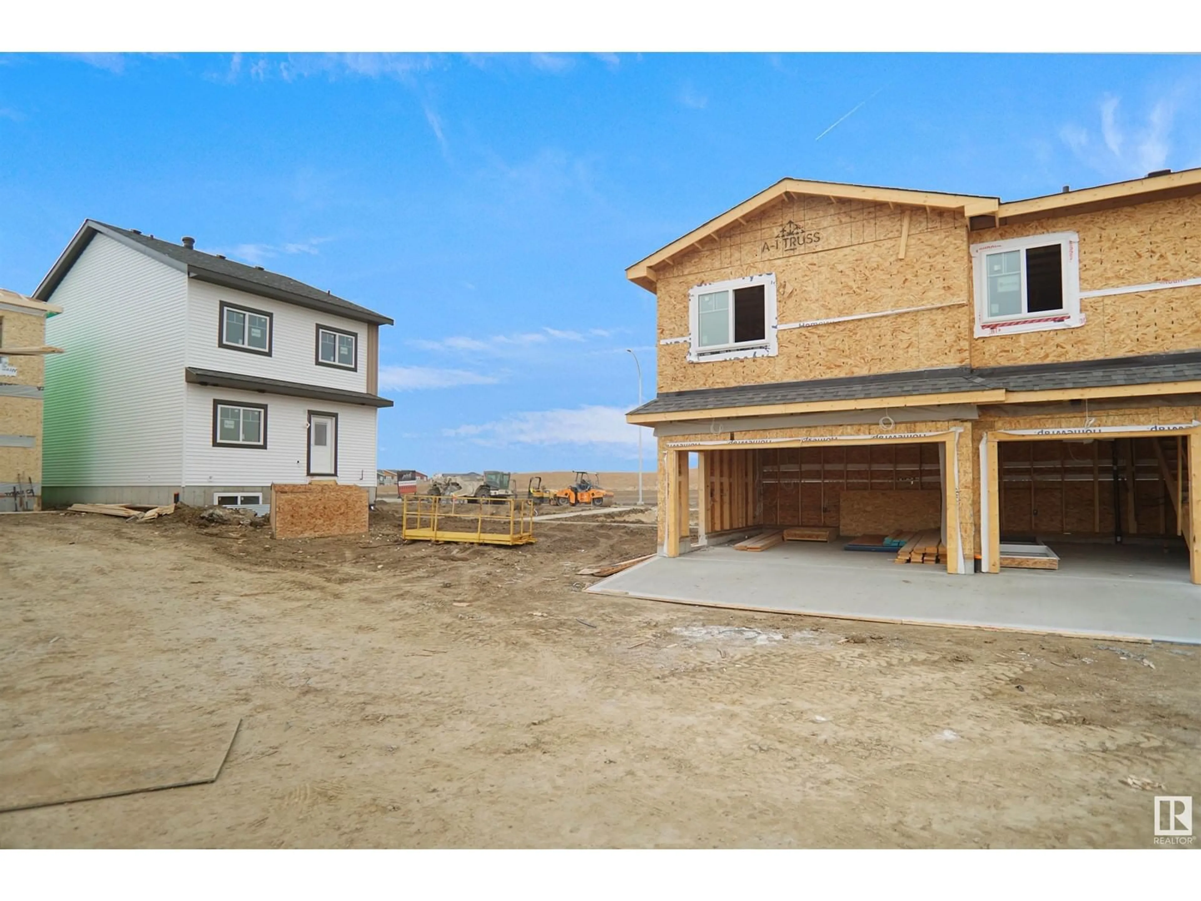 Frontside or backside of a home, the street view for 703 MATTSON DR SW, Edmonton Alberta T6X3G3