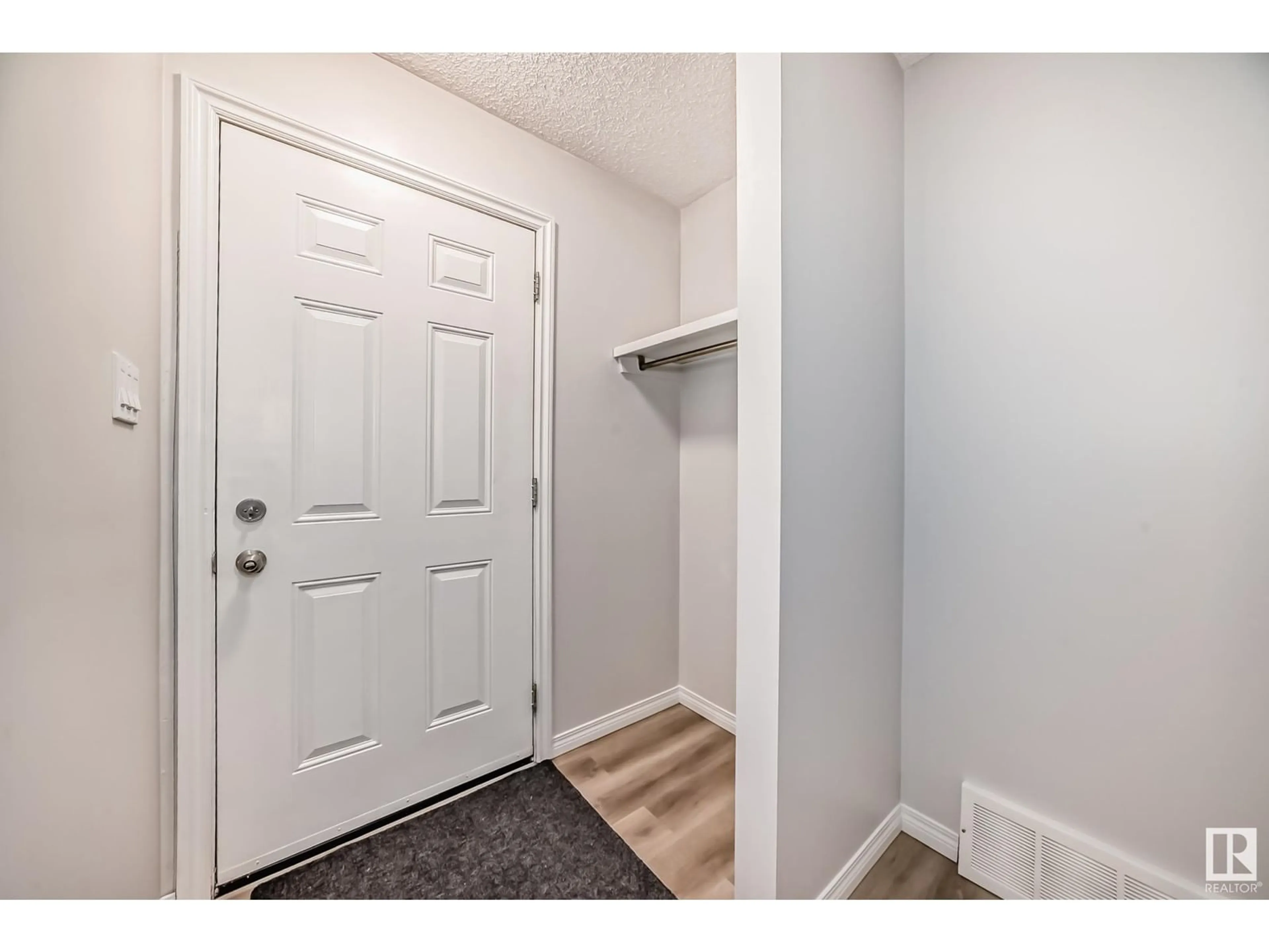 Indoor entryway, wood floors for 16916 91 ST NW, Edmonton Alberta T5Z1W6