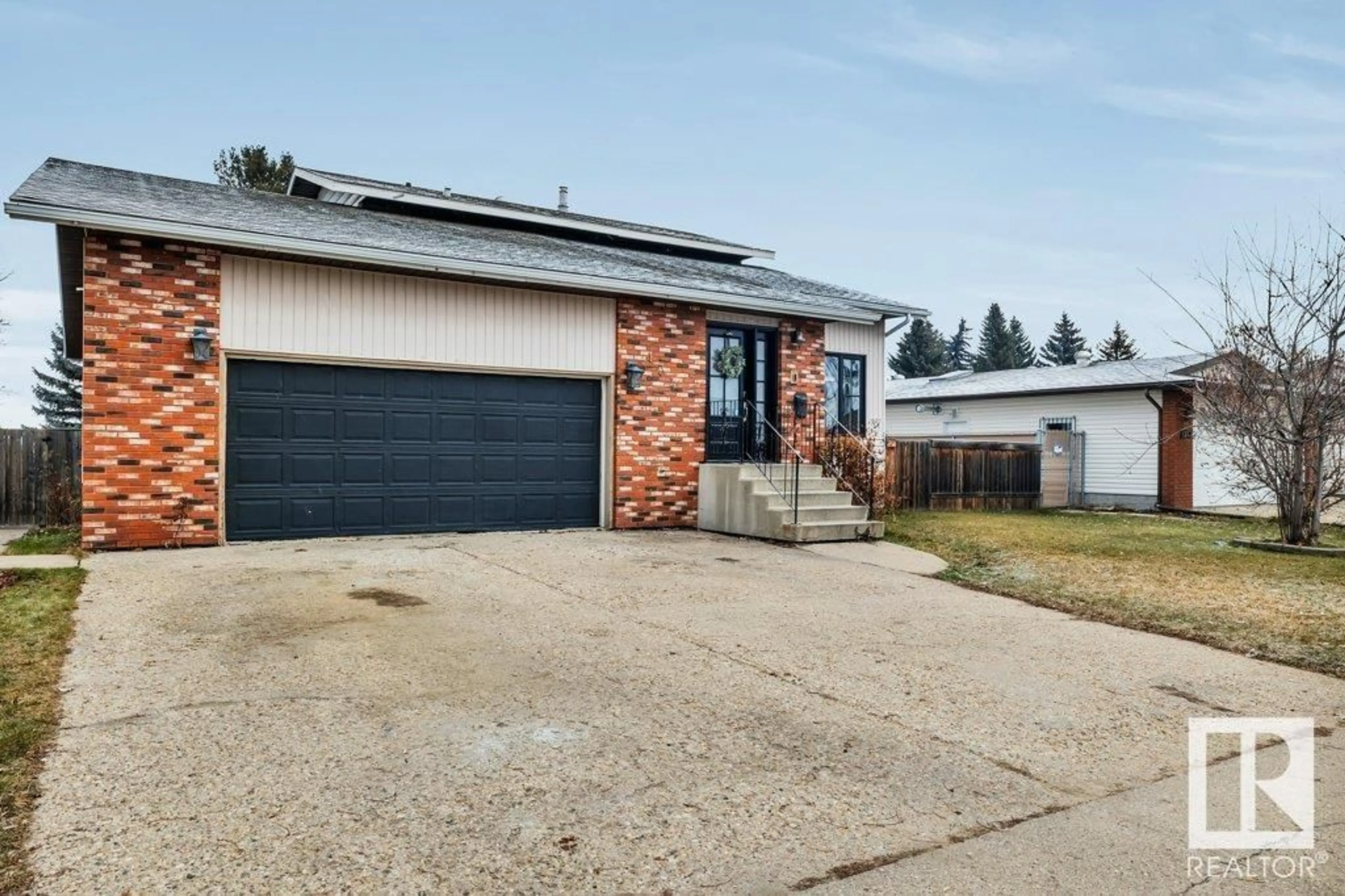 Frontside or backside of a home, the street view for 134 Willow Dr., Wetaskiwin Alberta T9A2X5