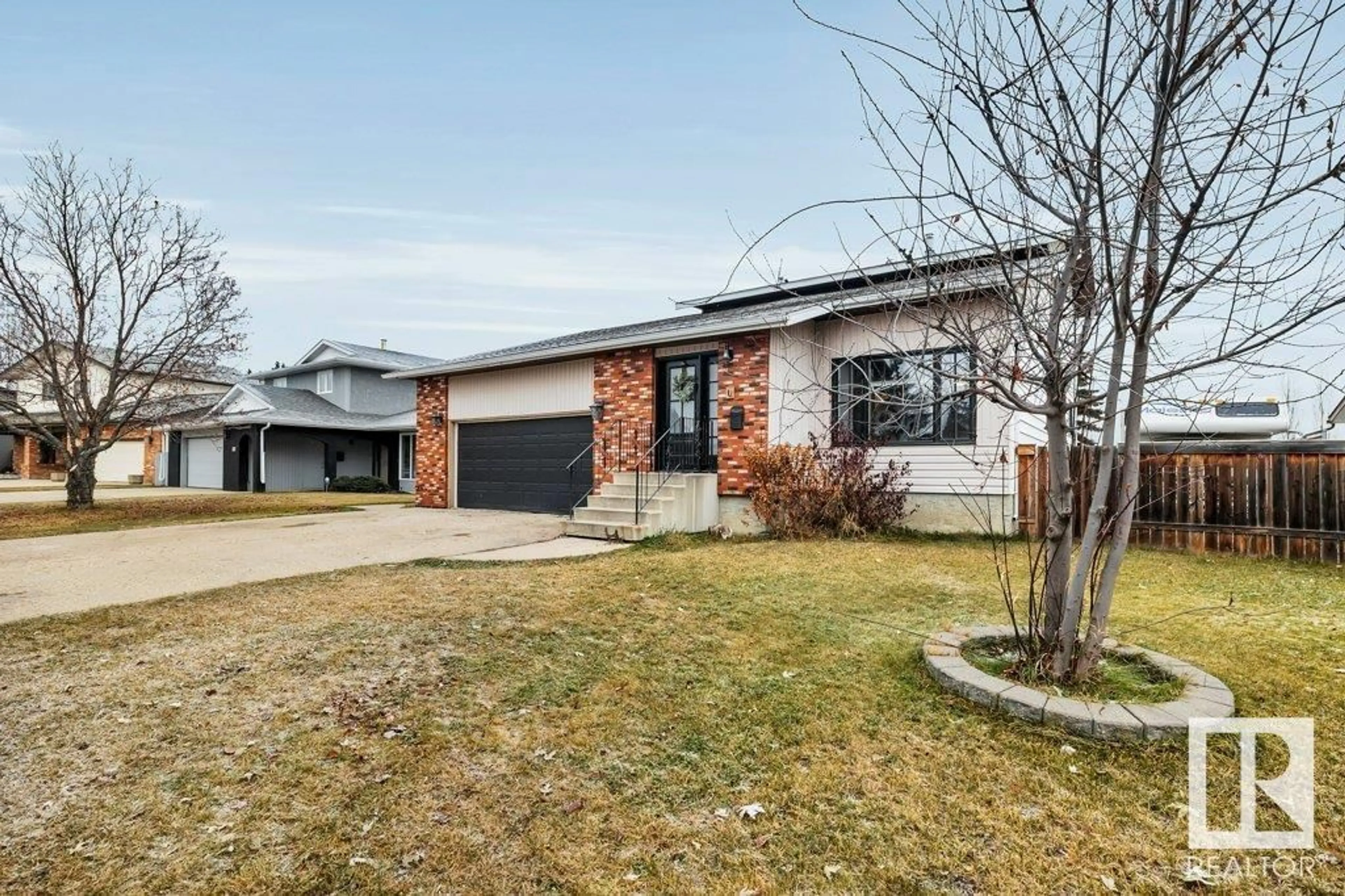 Frontside or backside of a home, the street view for 134 Willow Dr., Wetaskiwin Alberta T9A2X5