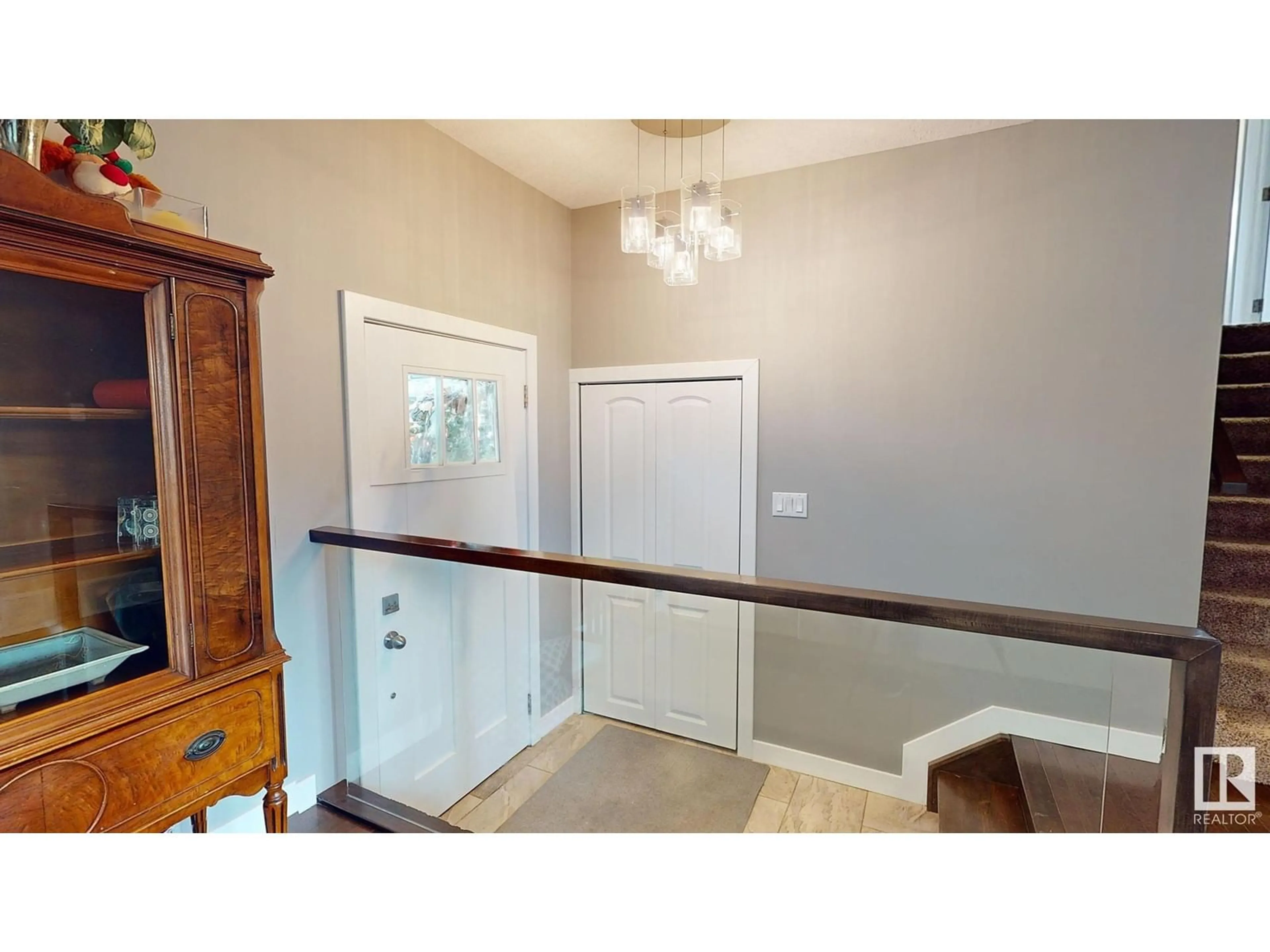 Indoor entryway, wood floors for 8611 BUENA VISTA RD NW, Edmonton Alberta T5R5R7