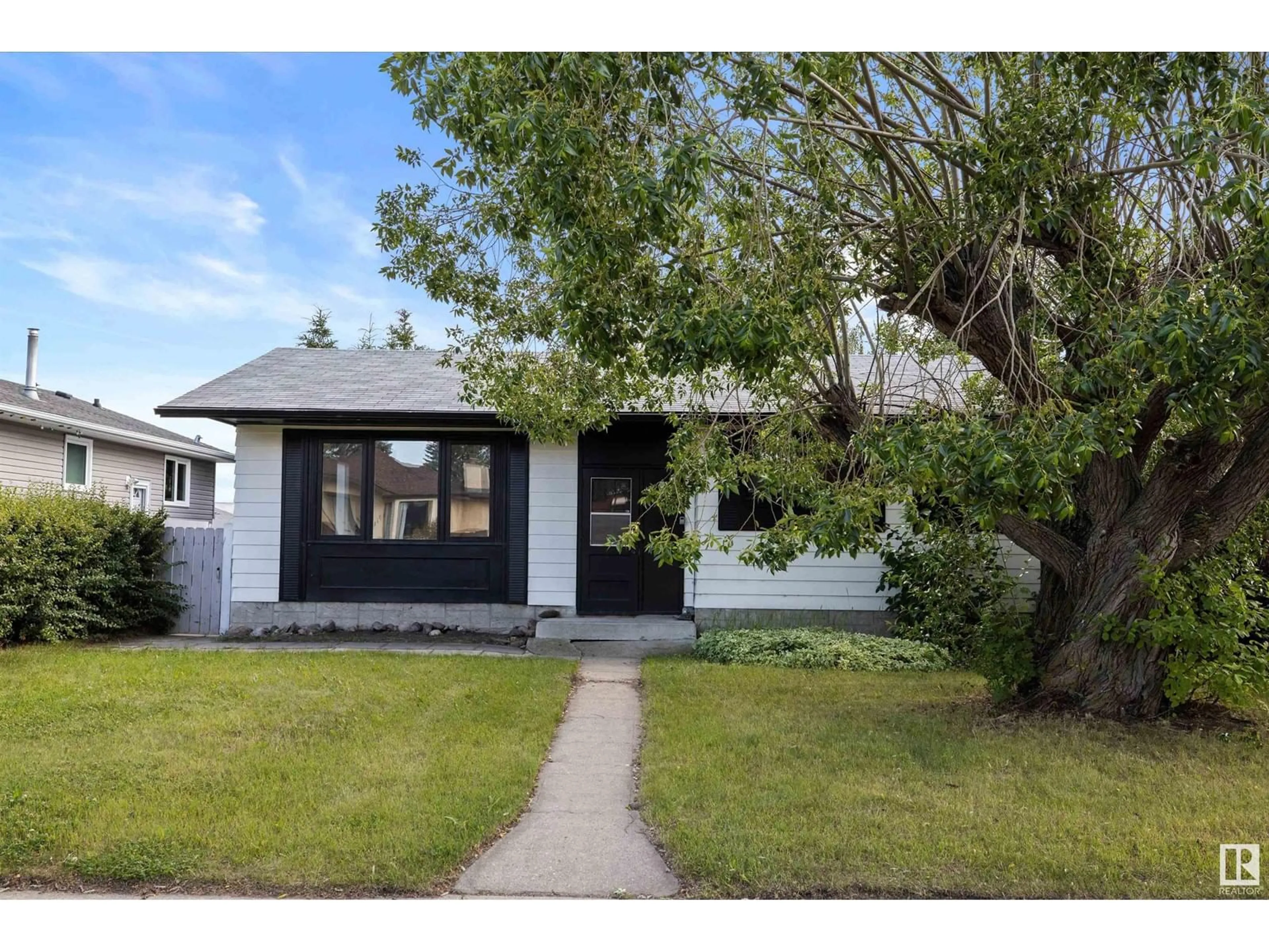 Frontside or backside of a home, cottage for 9115 151 AV NW, Edmonton Alberta T5E2P8